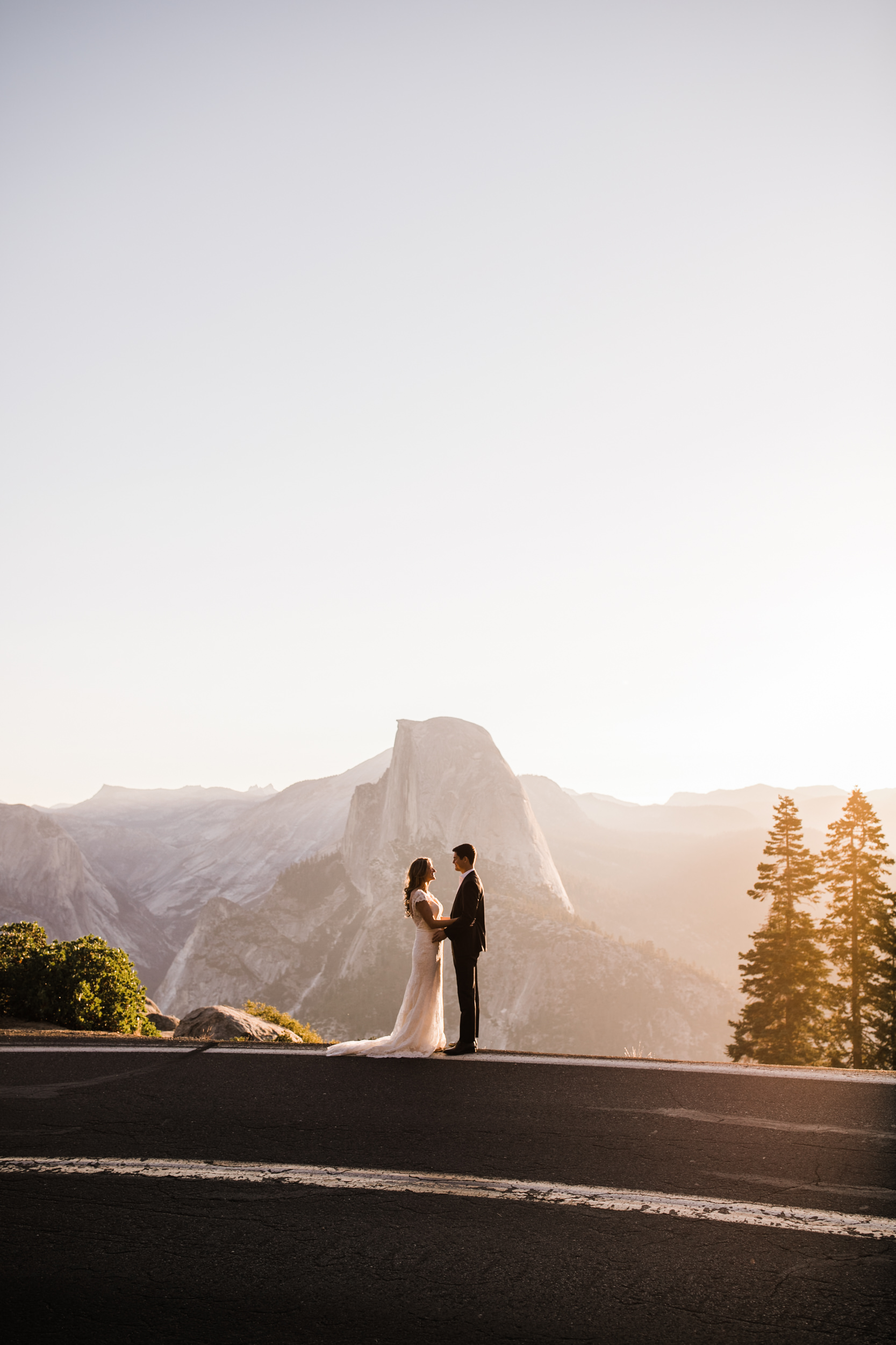 first look and wedding portraits at glacier point | bride and groom with a dog | yosemite national park elopement photographer | the hearnes adventure photography 