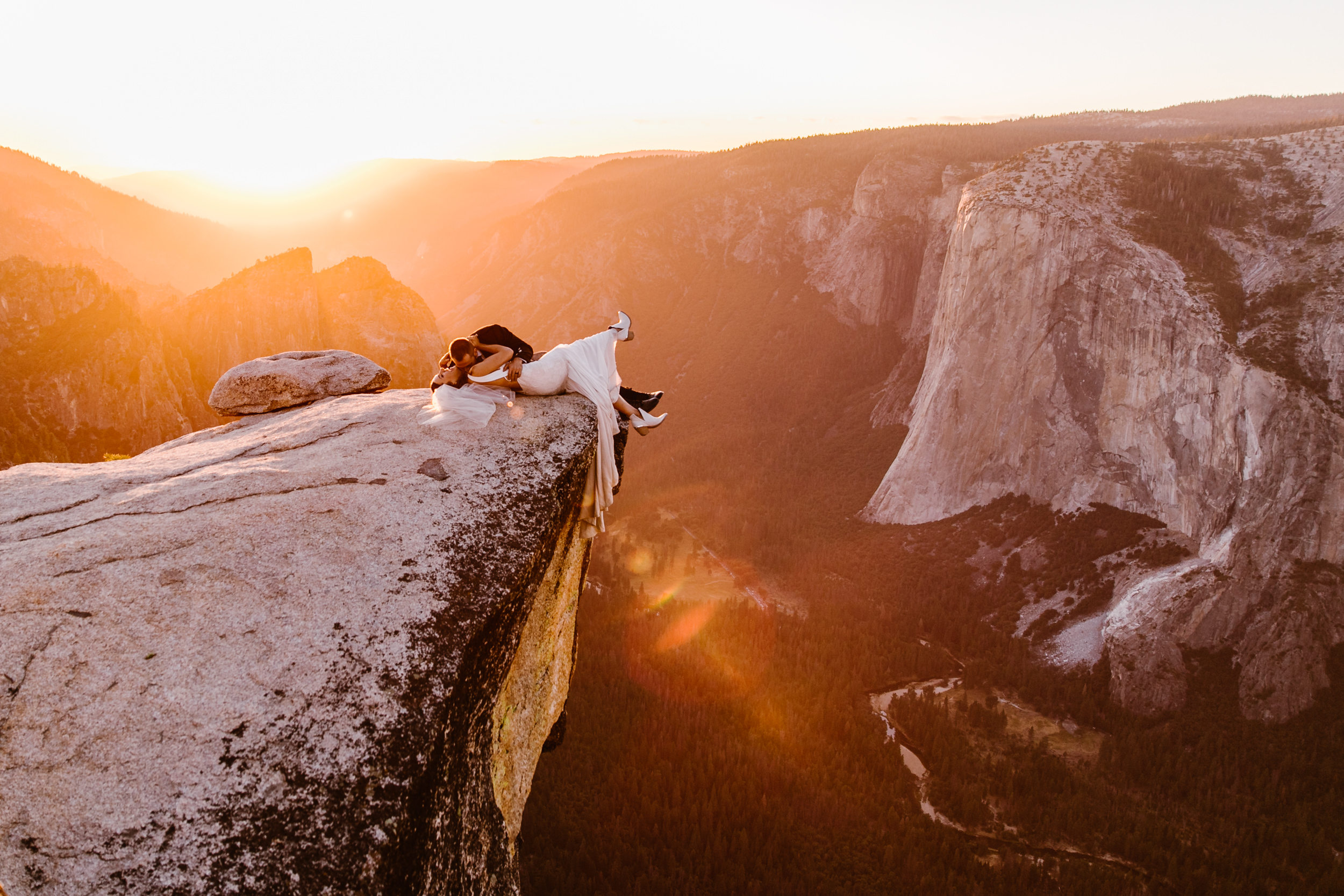 destination elopement in yosemite national park | ceremony + portraits at taft point | groom wearing a kilt + bride wearing boots | the hearnes elopement photography