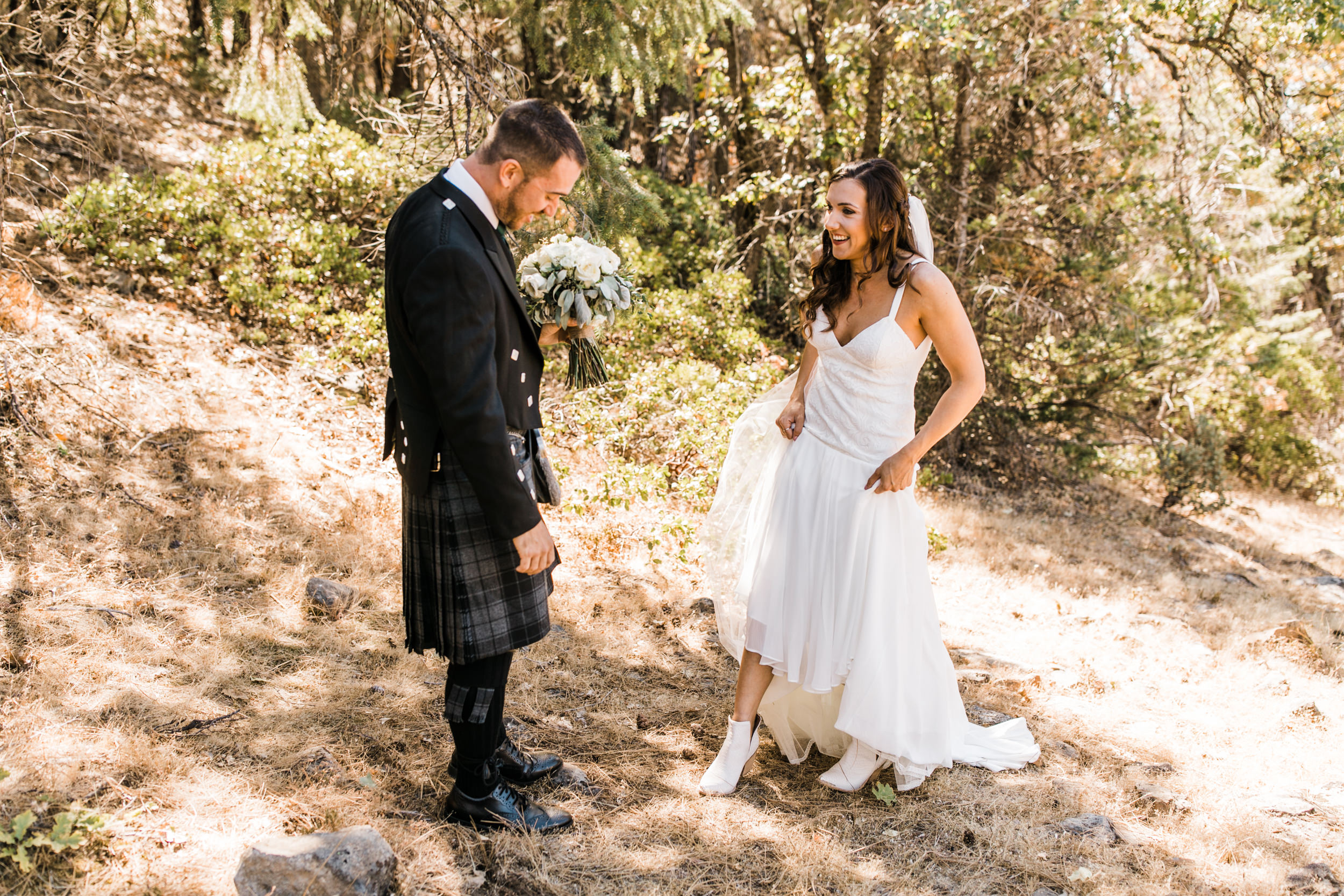 destination elopement in yosemite national park | ceremony + portraits at taft point | groom wearing a kilt + bride wearing boots | the hearnes elopement photography