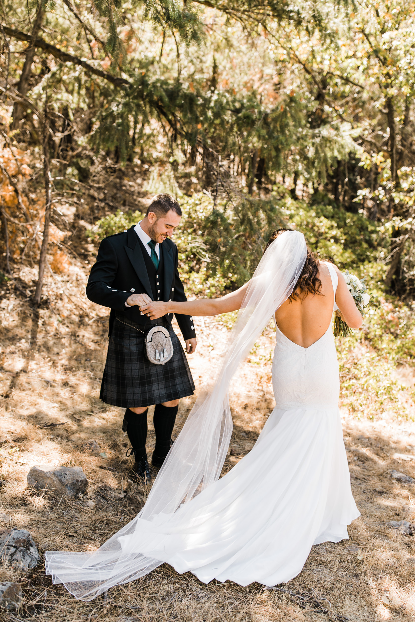 destination elopement in yosemite national park | ceremony + portraits at taft point | groom wearing a kilt + bride wearing boots | the hearnes elopement photography