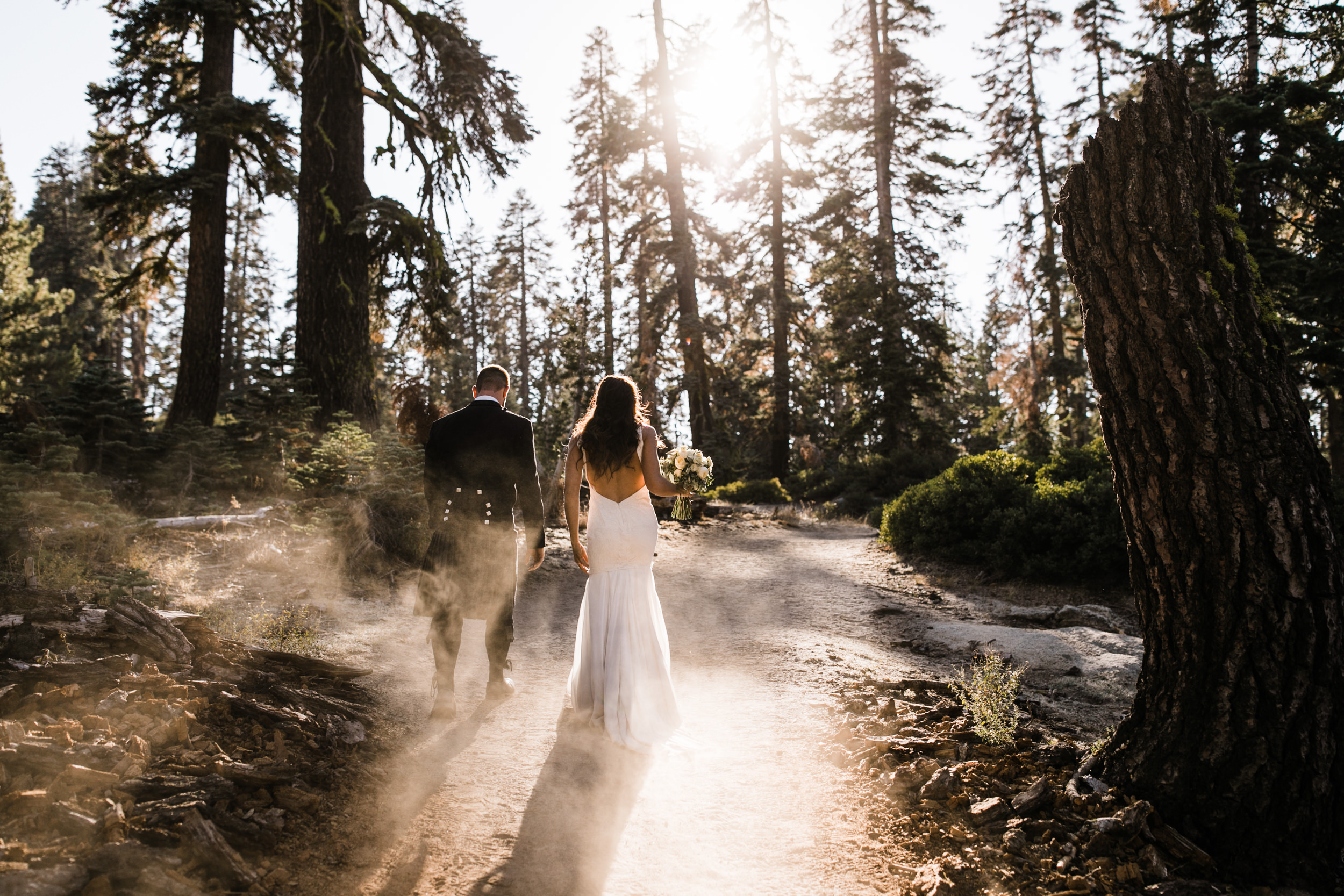 destination elopement in yosemite national park | ceremony + portraits at taft point | groom wearing a kilt + bride wearing boots | the hearnes elopement photography