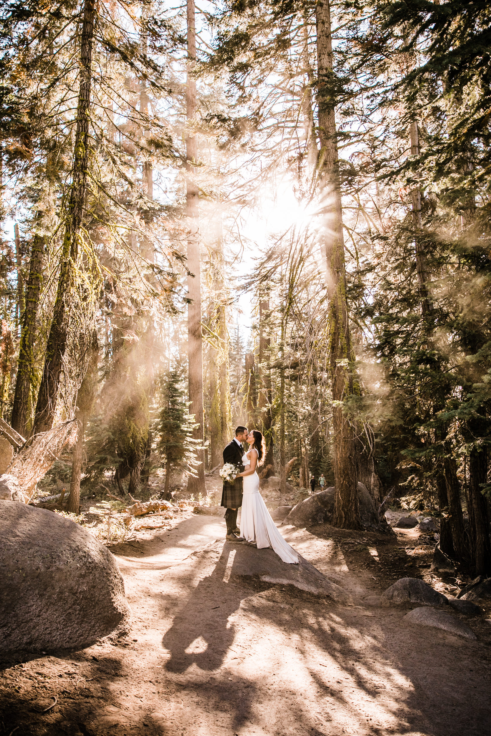 destination elopement in yosemite national park | ceremony + portraits at taft point | groom wearing a kilt + bride wearing boots | the hearnes elopement photography