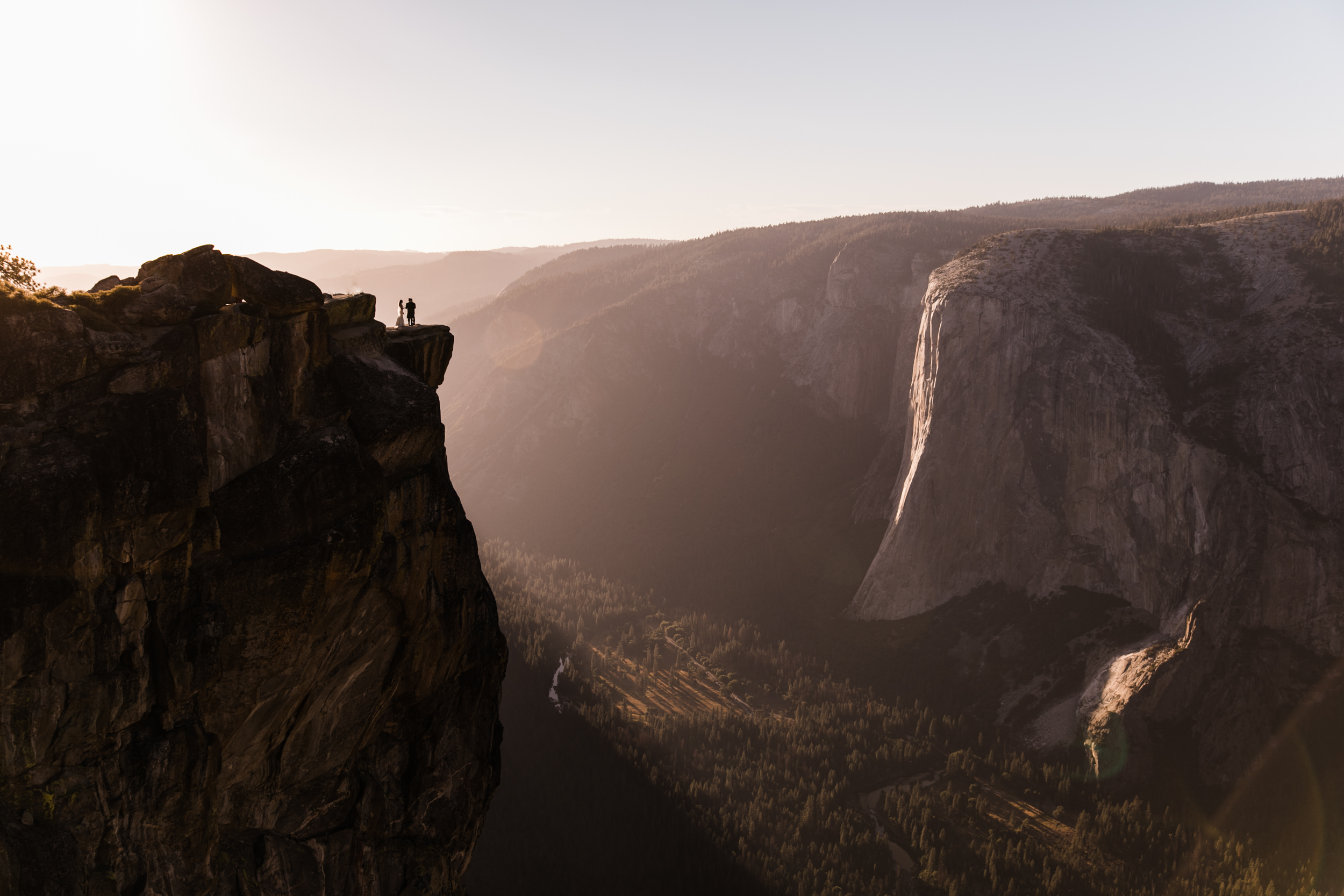 destination elopement in yosemite national park | ceremony + portraits at taft point | groom wearing a kilt + bride wearing boots | the hearnes elopement photography