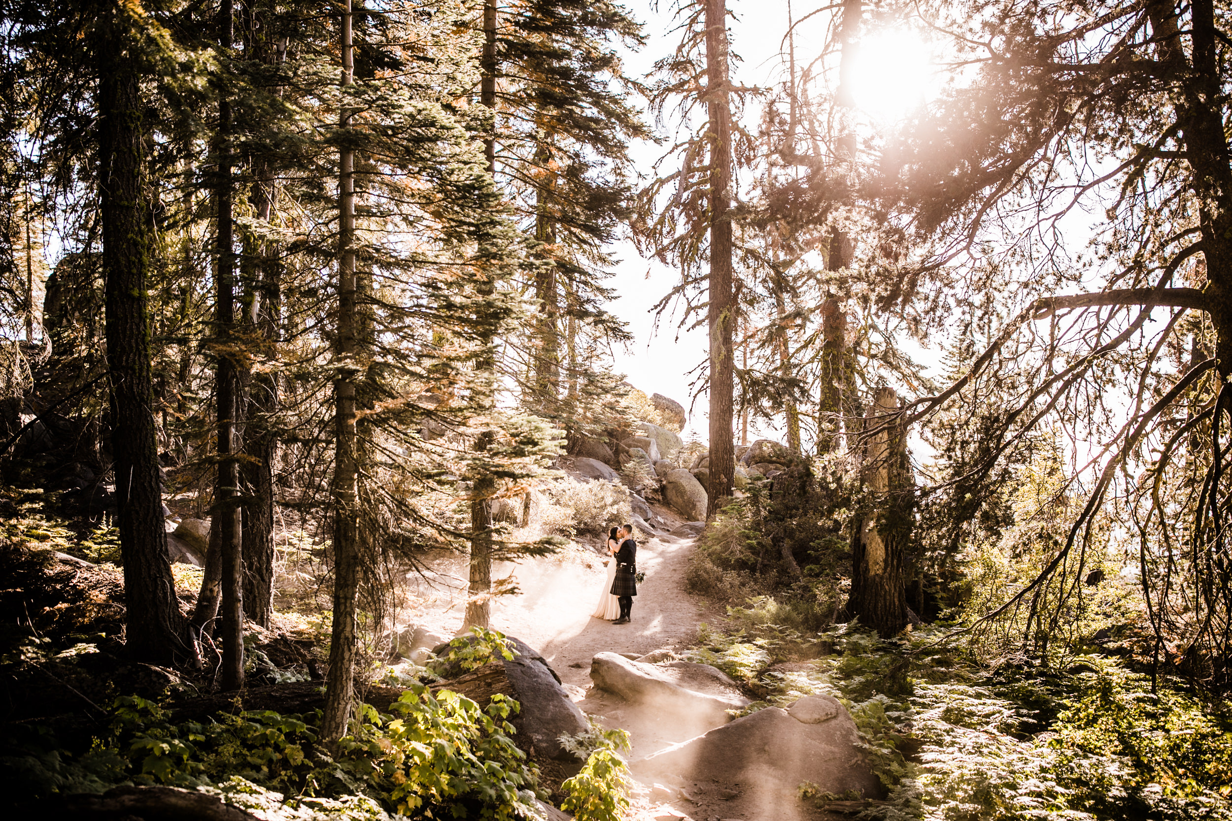 destination elopement in yosemite national park | ceremony + portraits at taft point | groom wearing a kilt + bride wearing boots | the hearnes elopement photography