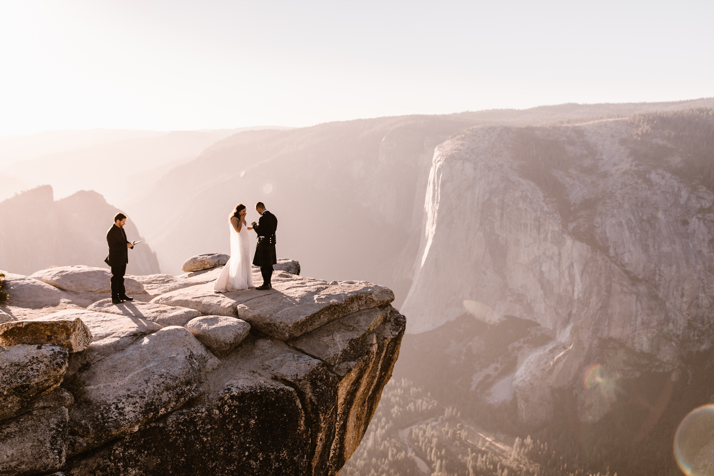destination elopement in yosemite national park | ceremony + portraits at taft point | groom wearing a kilt + bride wearing boots | the hearnes elopement photography