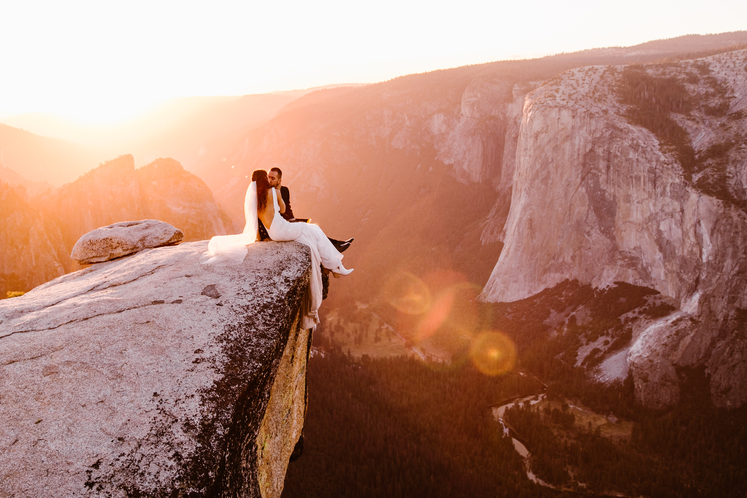 destination elopement in yosemite national park | ceremony + portraits at taft point | groom wearing a kilt + bride wearing boots | the hearnes elopement photography