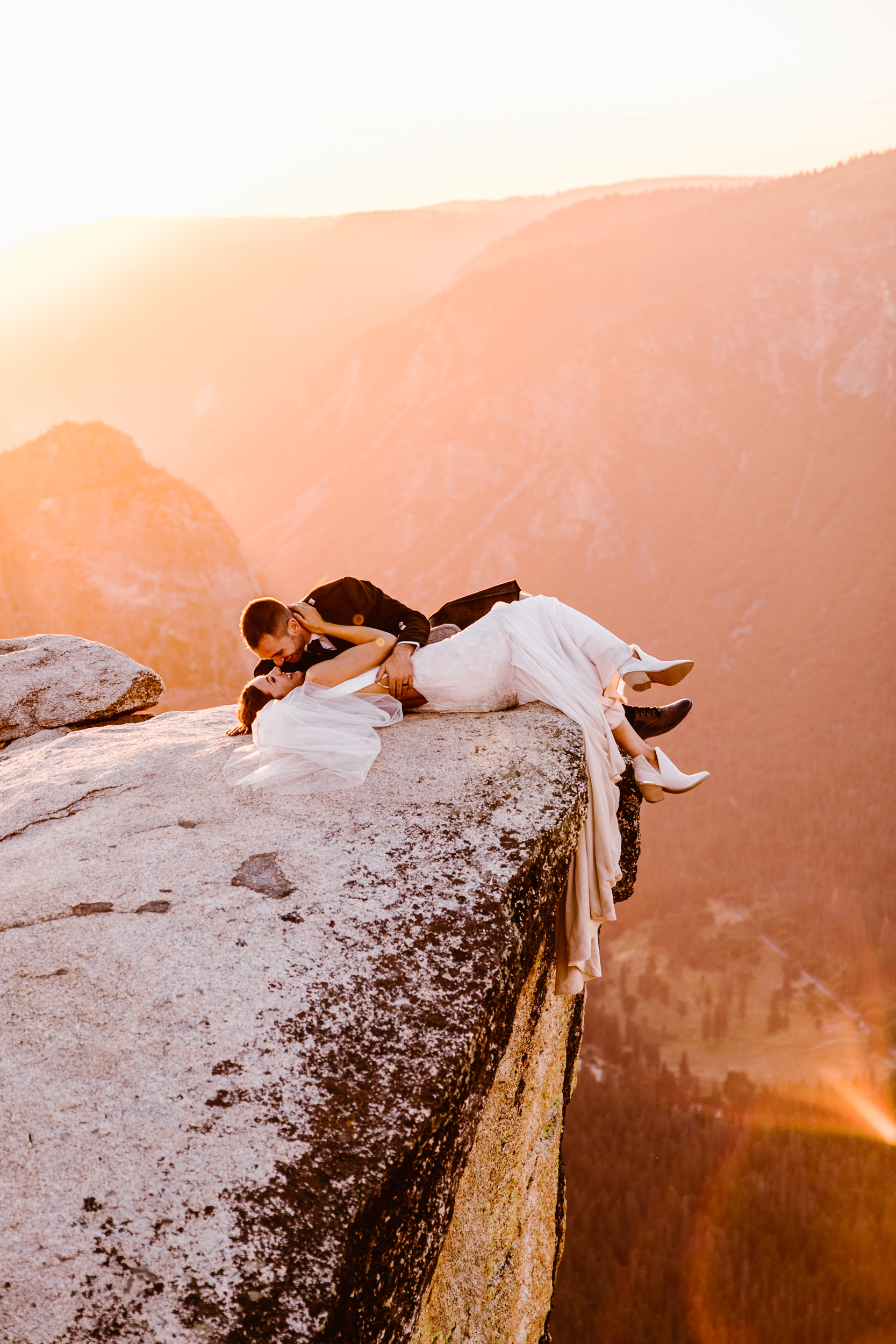 destination elopement in yosemite national park | ceremony + portraits at taft point | groom wearing a kilt + bride wearing boots | the hearnes elopement photography