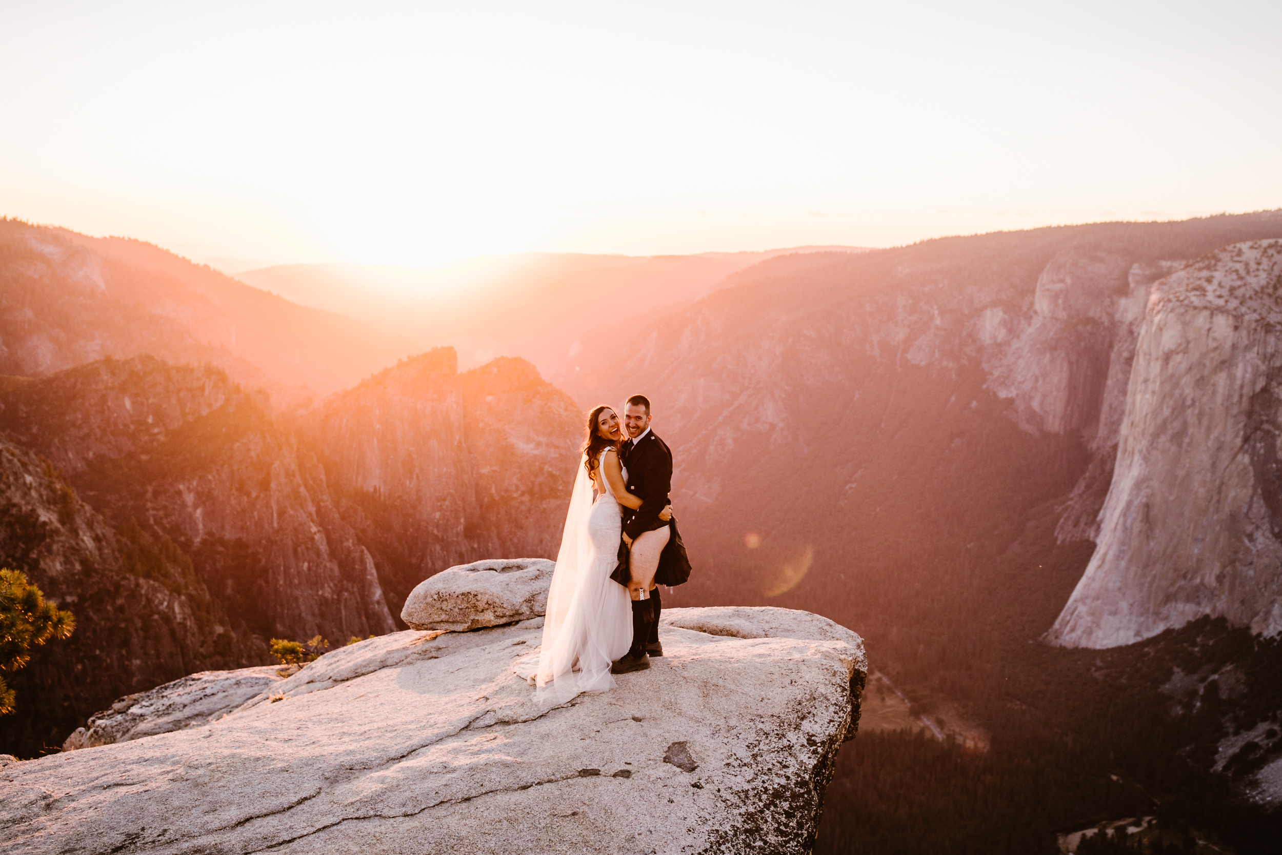 destination elopement in yosemite national park | ceremony + portraits at taft point | groom wearing a kilt + bride wearing boots | the hearnes elopement photography