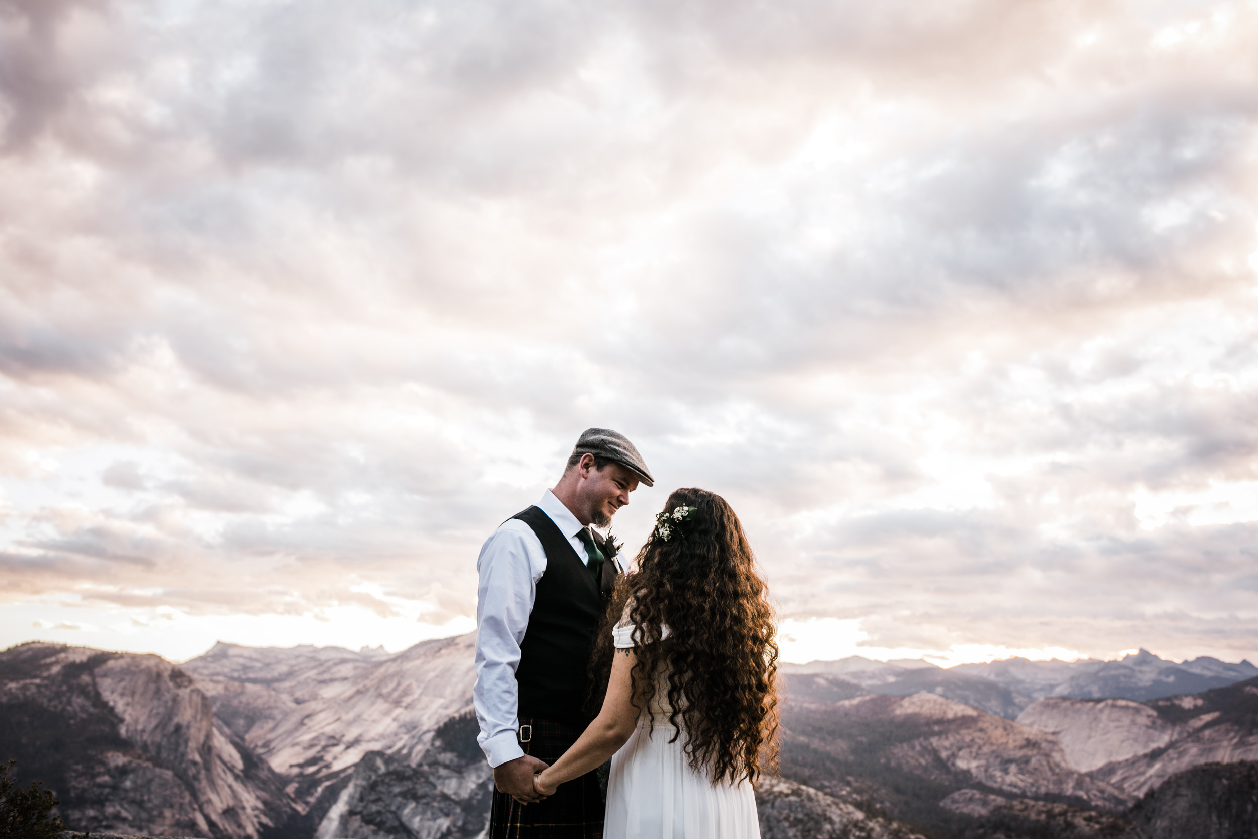 morgan + trevor’s intimate wedding in yosemite national park | private vows at sunrise + wedding ceremony at Glacier Point | groom wearing a kilt | adventure elopement photographer