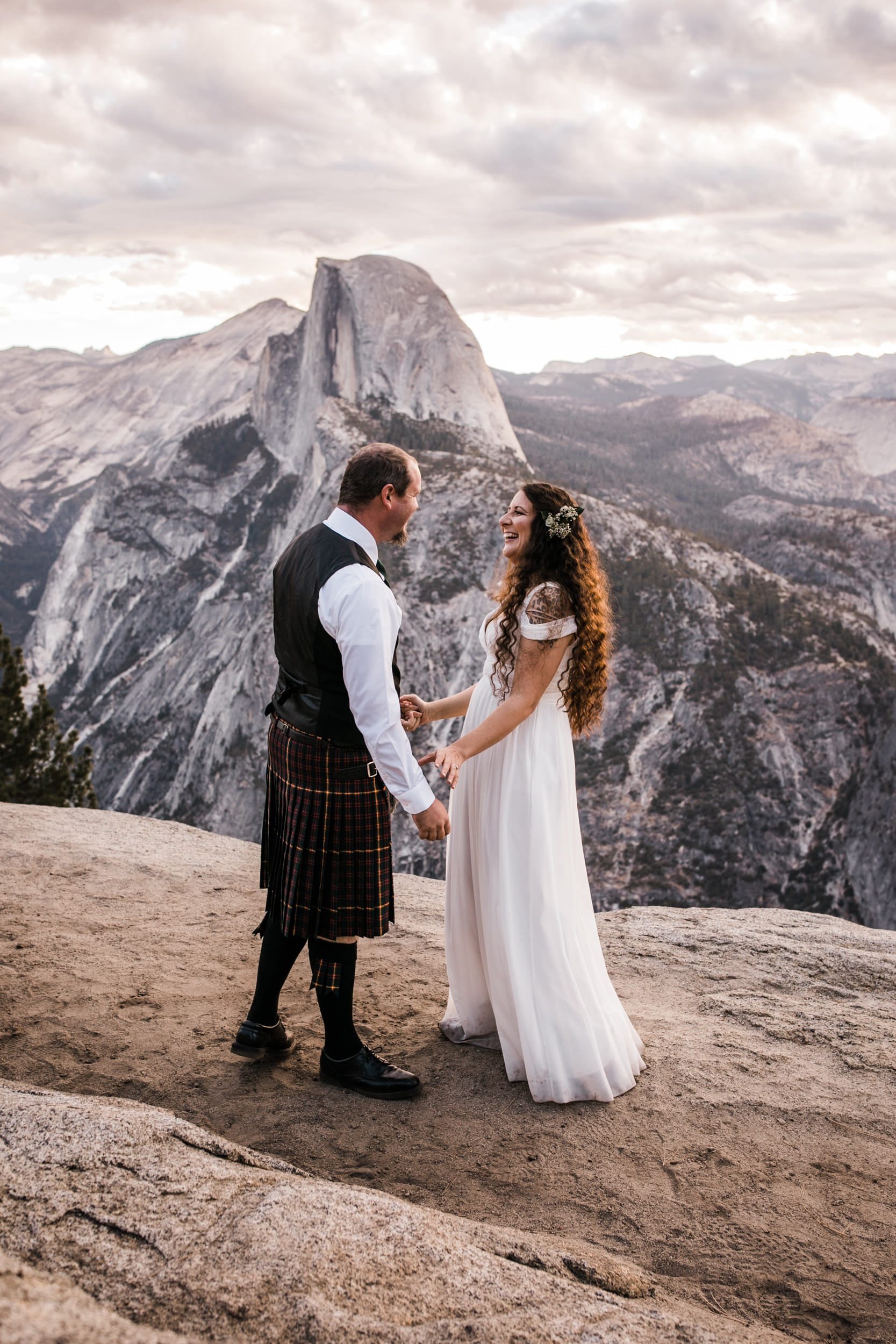 morgan + trevor’s intimate wedding in yosemite national park | private vows at sunrise + wedding ceremony at Glacier Point | groom wearing a kilt | adventure elopement photographer