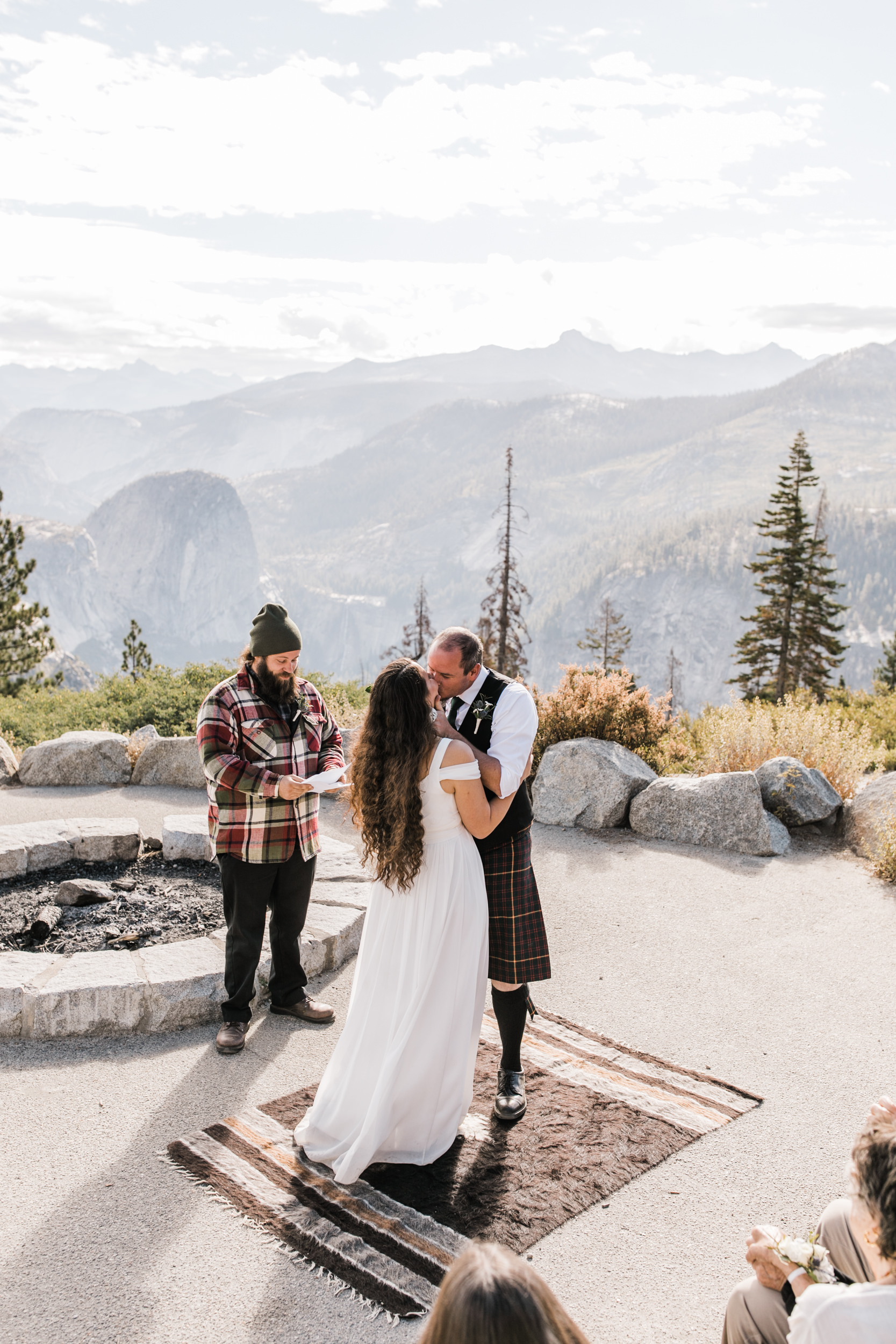 morgan + trevor’s intimate wedding in yosemite national park | private vows at sunrise + wedding ceremony at Glacier Point | groom wearing a kilt | adventure elopement photographer