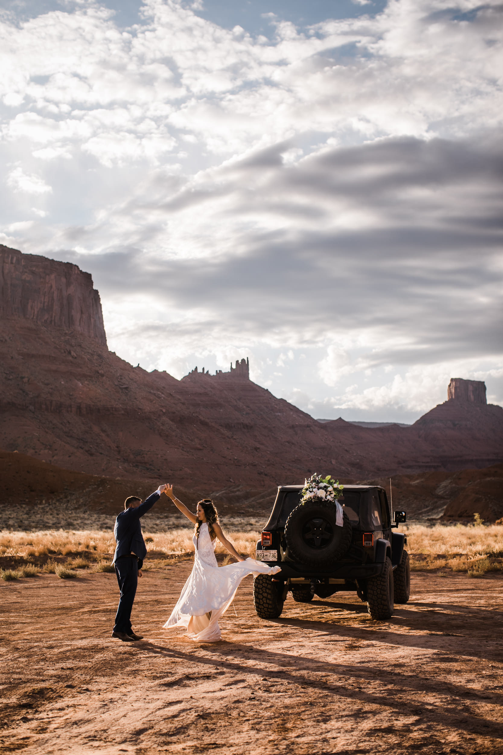 adventure jeep wedding in the utah desert | rue de seine bride | blue tux groom | moab elopement photographer | the hearnes adventure photography