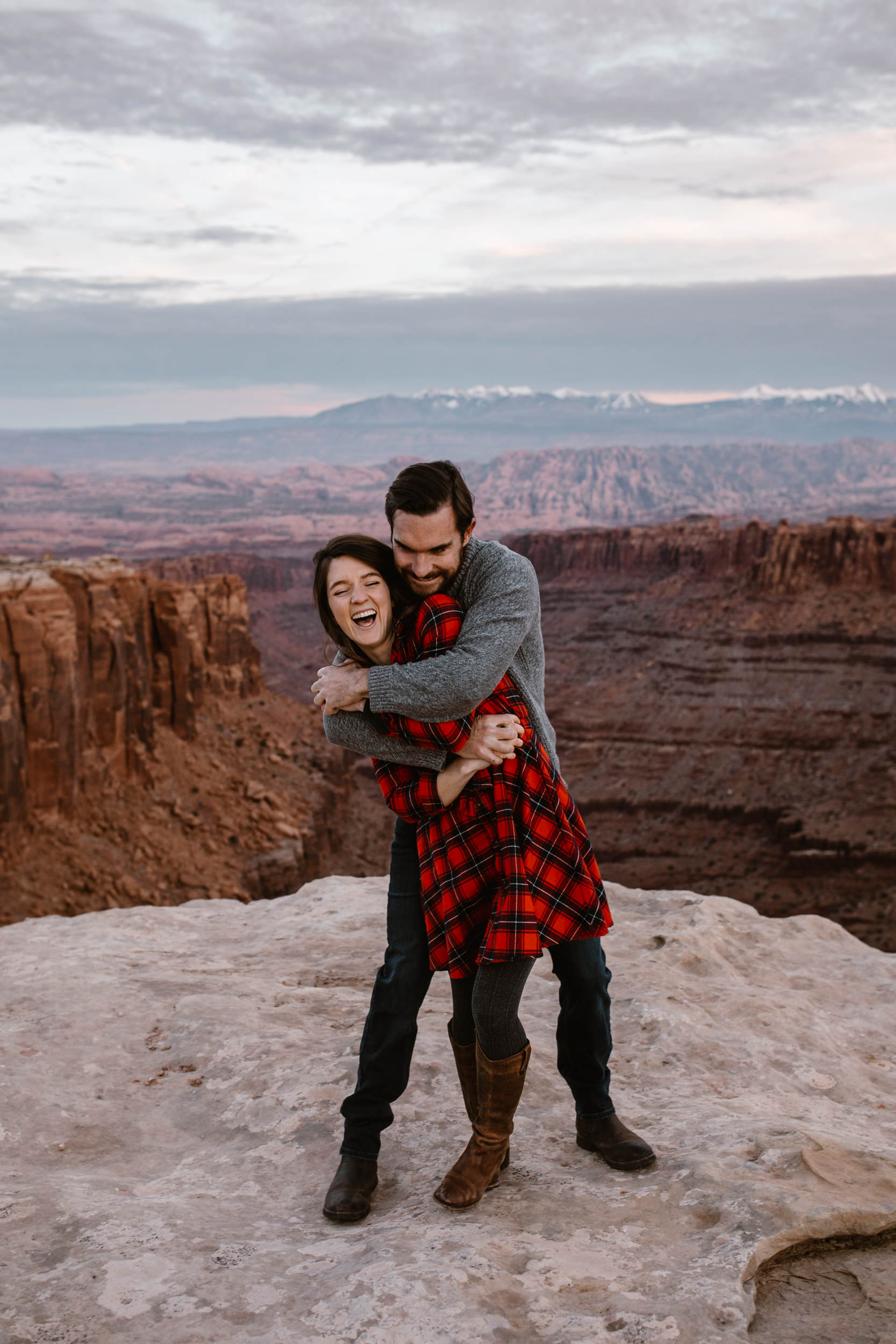 van life engagement photos | outdoor picnic in Moab, Utah | charcuterie and wine in the desert | the hearnes adventure photography