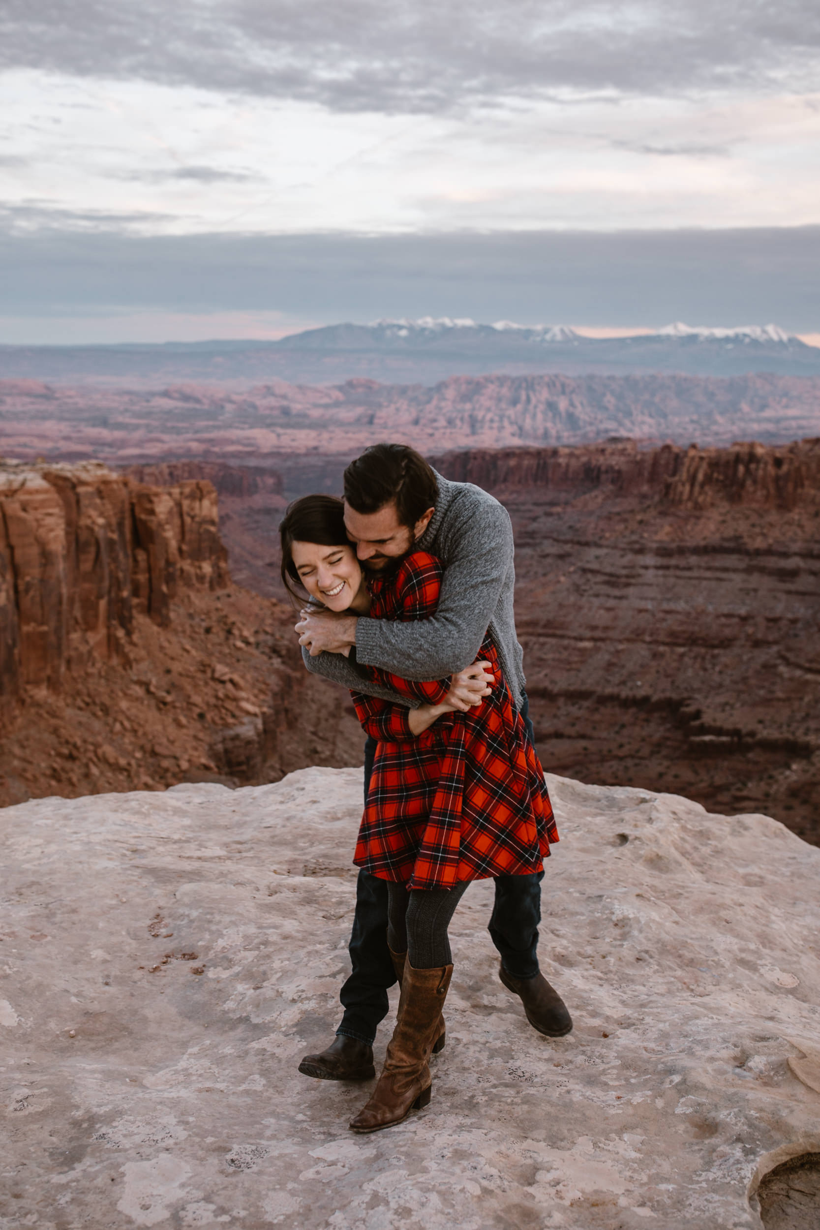 van life engagement photos | outdoor picnic in Moab, Utah | charcuterie and wine in the desert | the hearnes adventure photography
