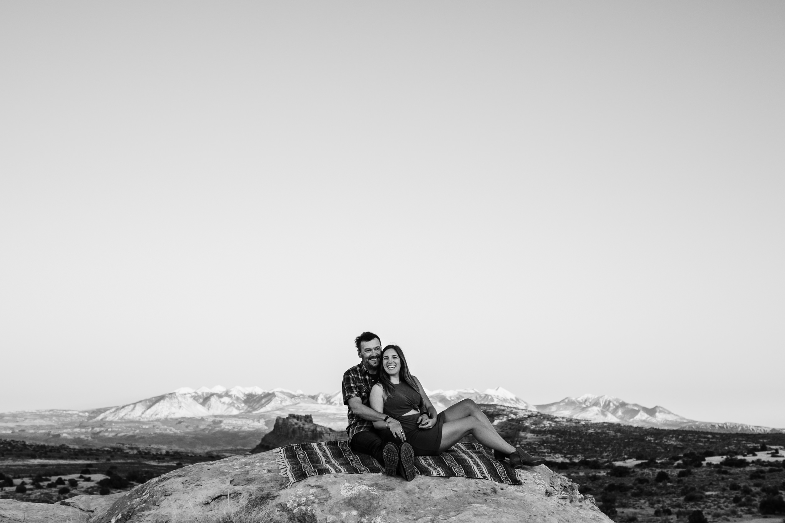 outdoorsy adventure engagement session in the moab desert