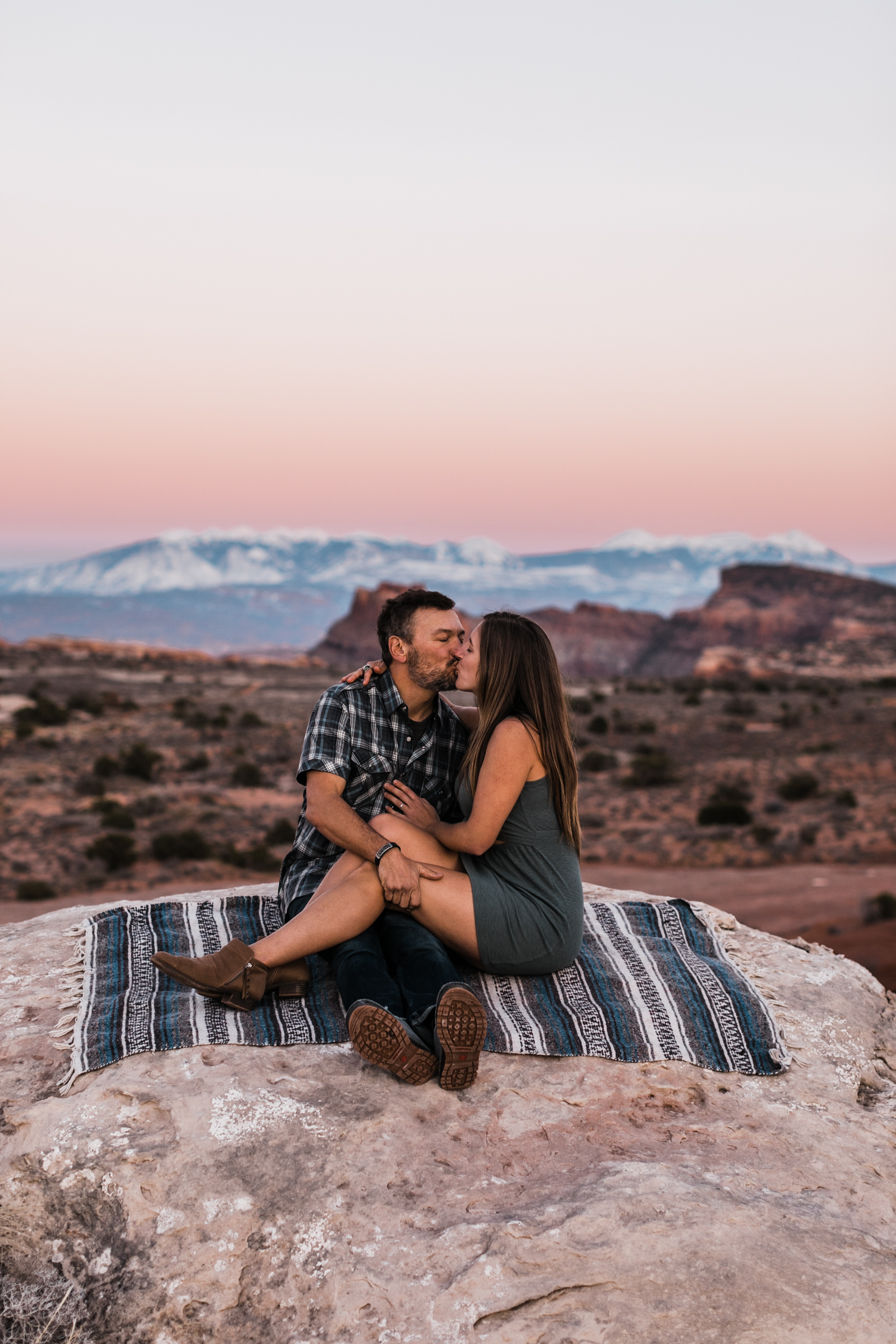 outdoorsy adventure engagement session in the moab desert