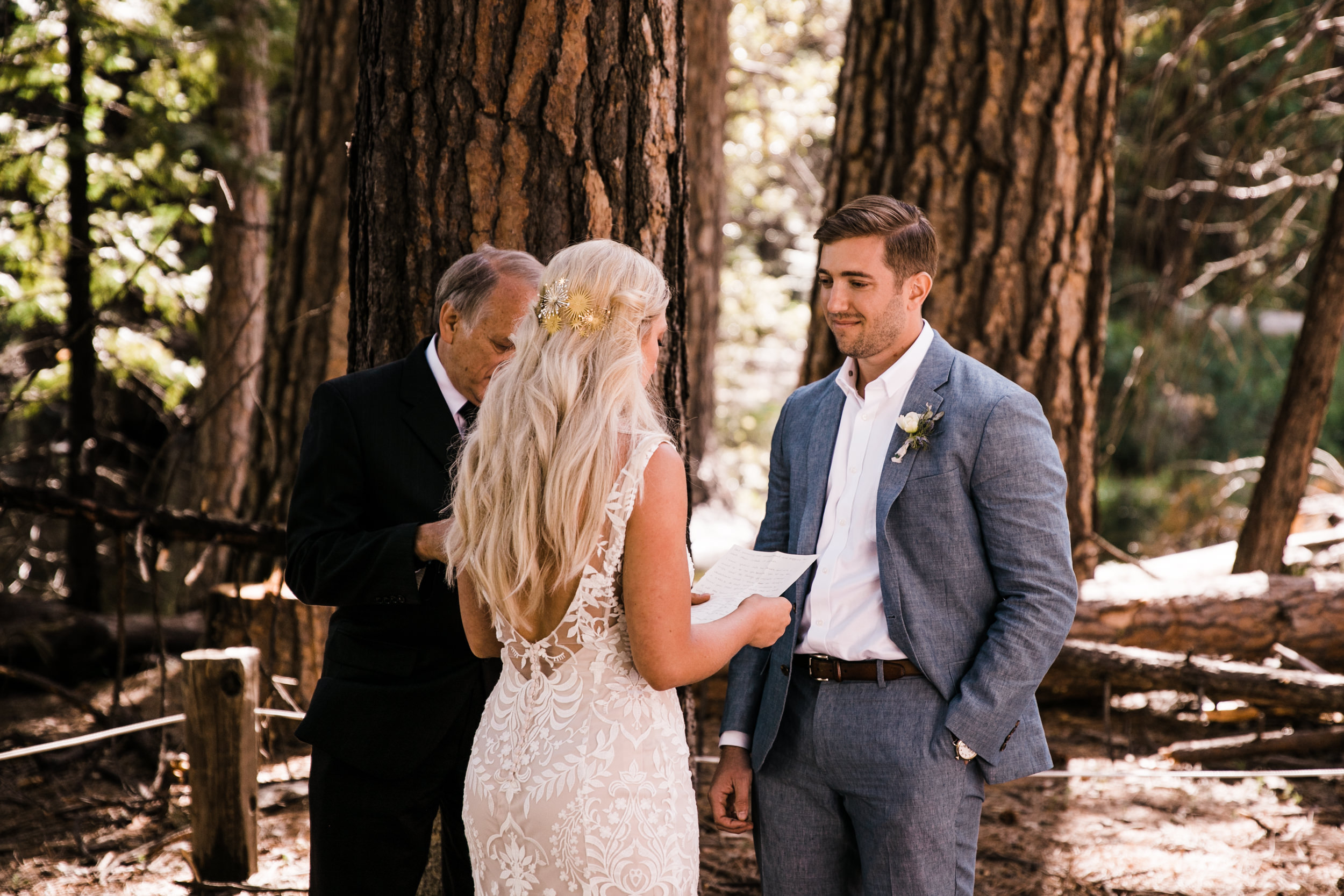 Erika + Grant’s intimate Yosemite National Park destination wedding + romantic backyard reception under twinkle lights | ceremony in the woods in yosemite valley | the hearnes adventure photography