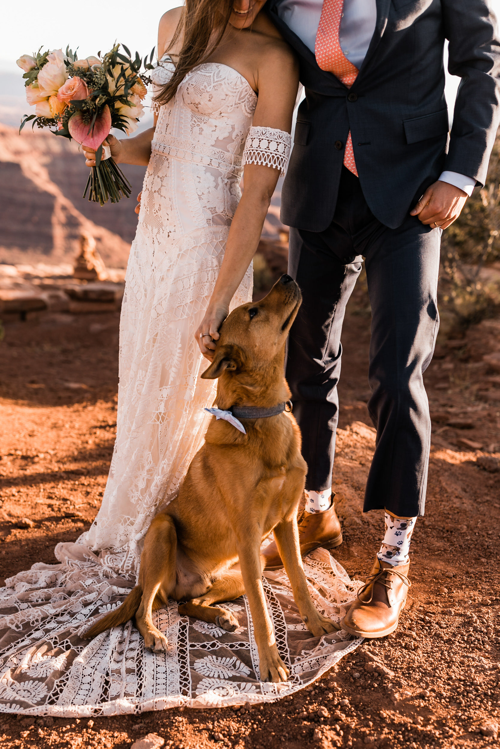 Adventurous jeep elopement in Moab, Utah | Rue de Seine Boho Desert Bride | Maroon Suit | Wedding with a dog | The Hearnes Adventure Photography