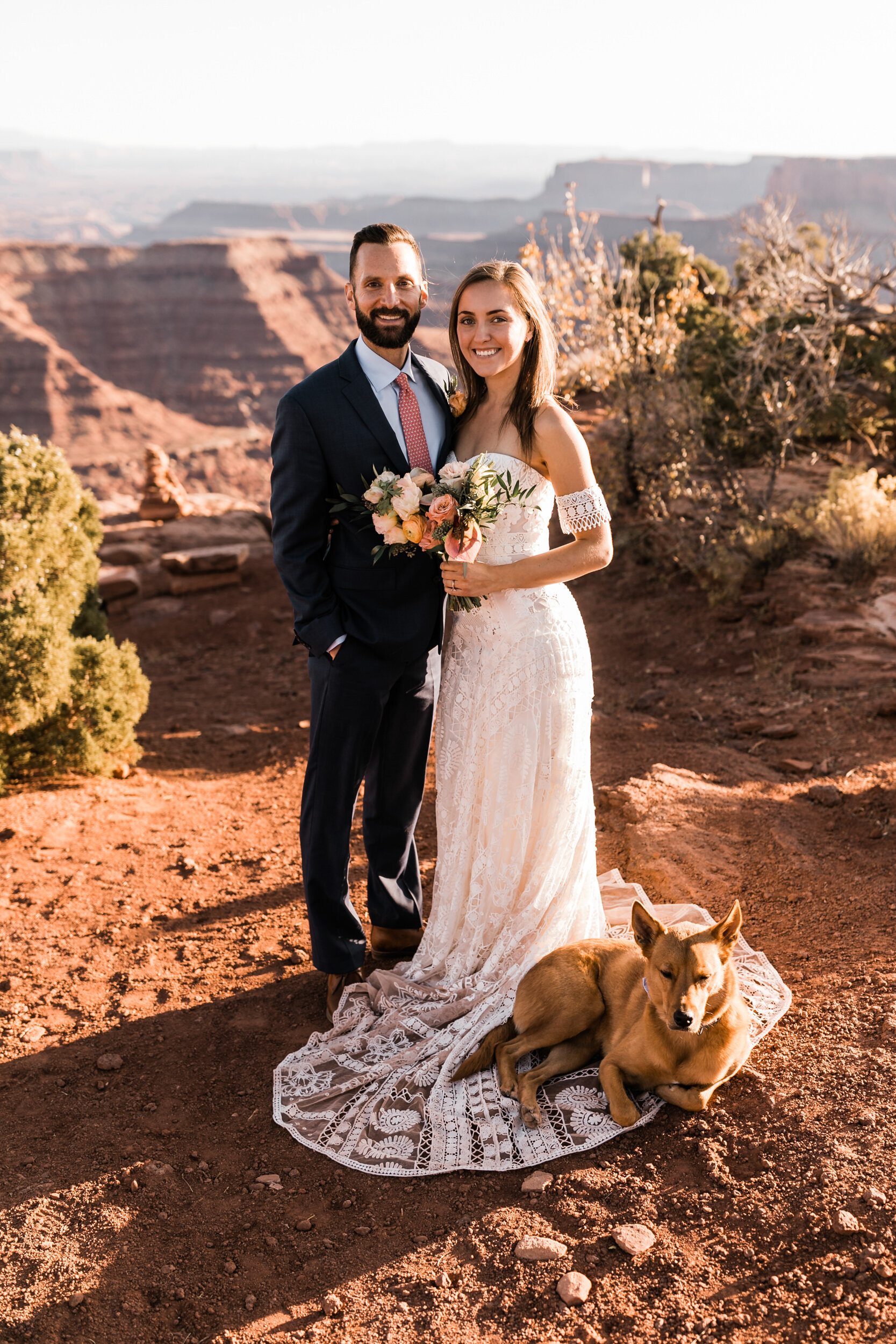 Adventurous jeep elopement in Moab, Utah | Rue de Seine Boho Desert Bride | Maroon Suit | Wedding with a dog | The Hearnes Adventure Photography