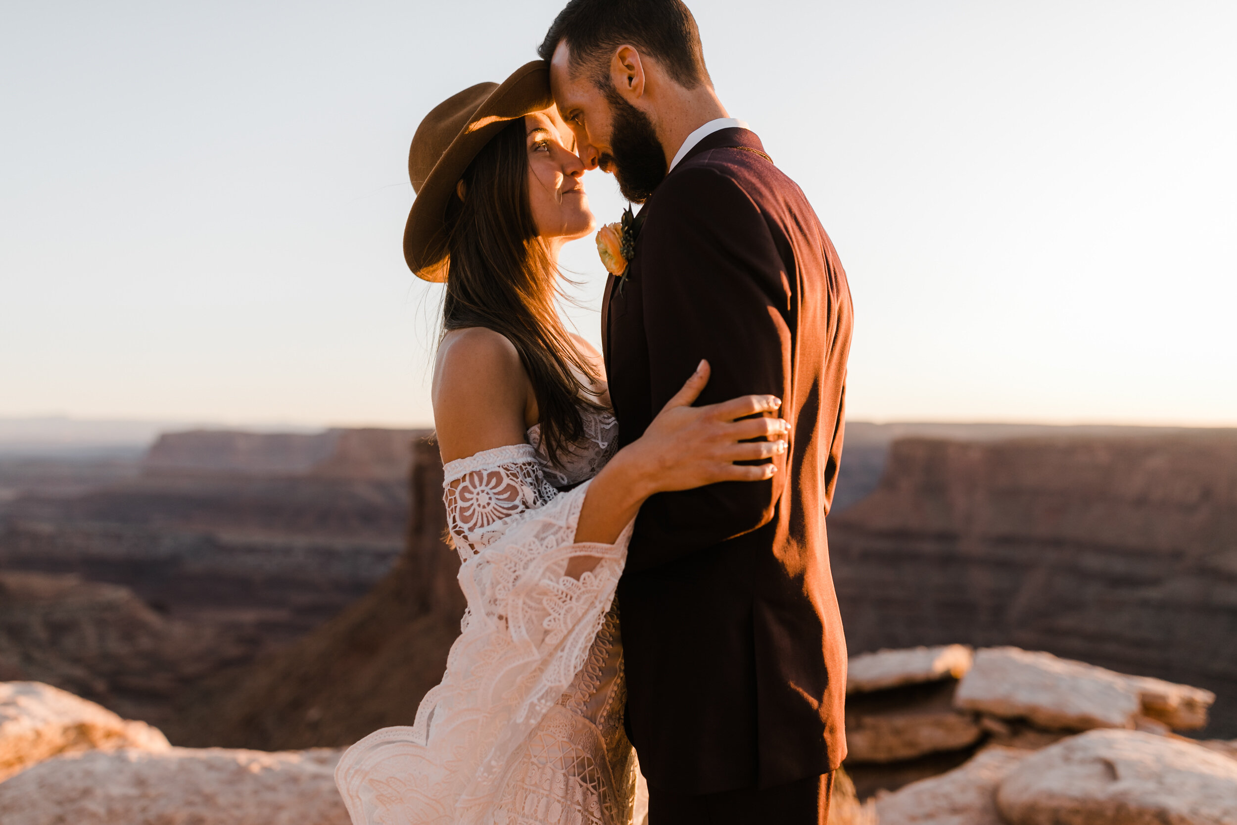 Adventurous jeep elopement in Moab, Utah | Rue de Seine Boho Desert Bride | Maroon Suit | Wedding with a dog | The Hearnes Adventure Photography