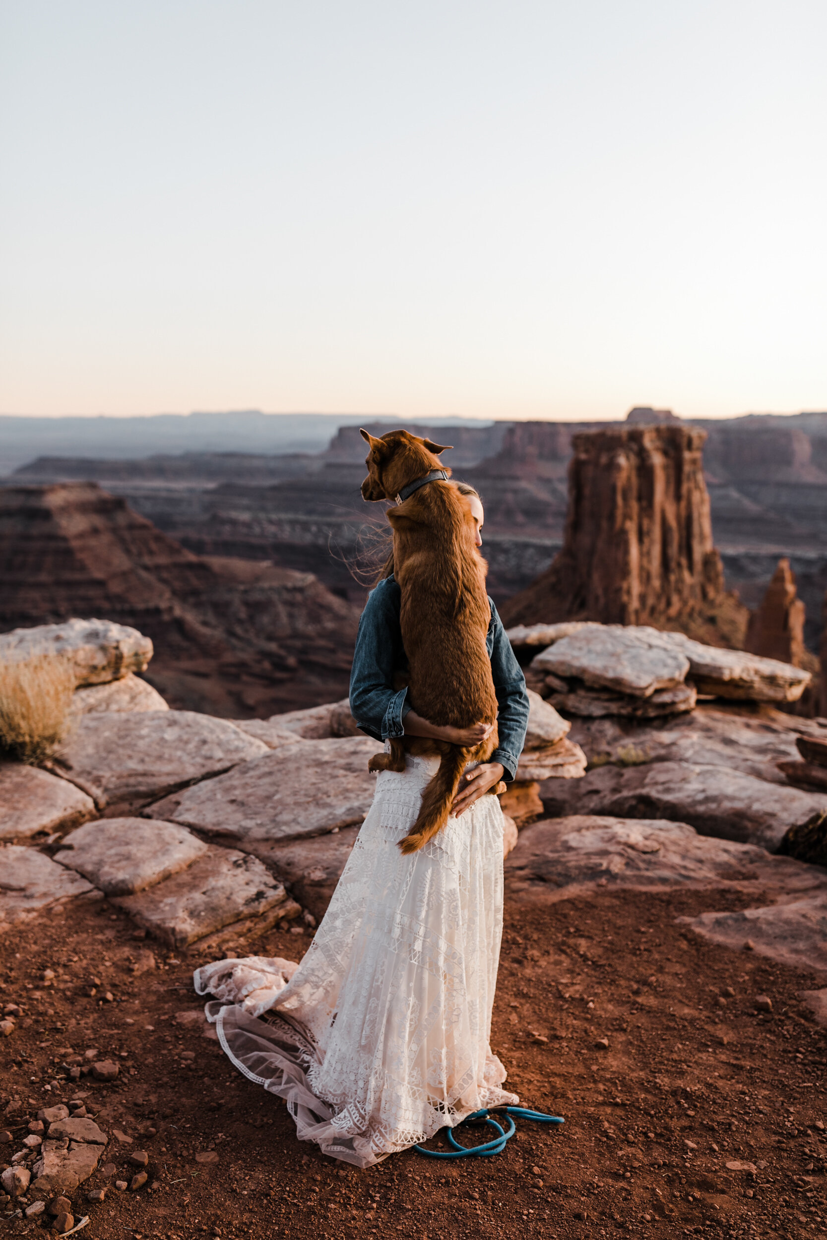 Adventurous jeep elopement in Moab, Utah | Rue de Seine Boho Desert Bride | Maroon Suit | Wedding with a dog | The Hearnes Adventure Photography