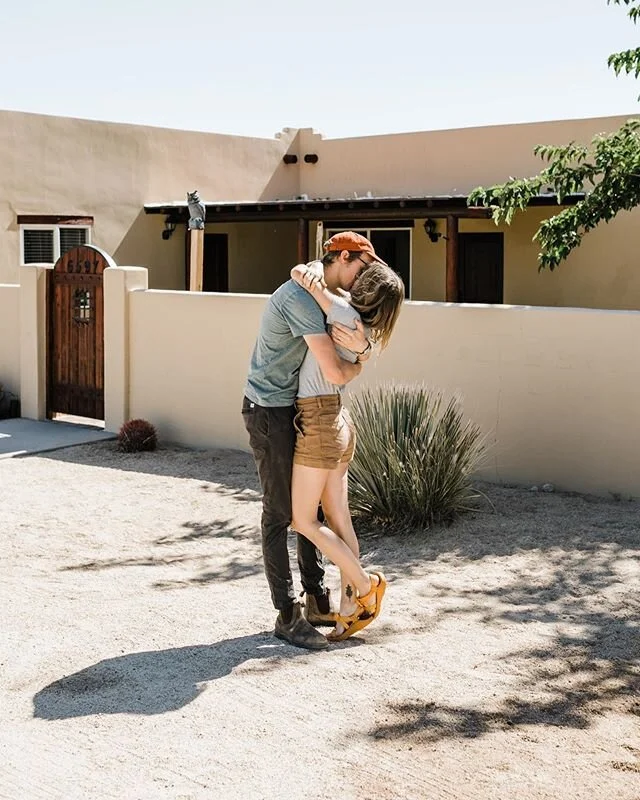 Our best friends bought a house in the desert! Sadly, it wasn&rsquo;t our same desert but I&rsquo;ll forgive them because now we have more reason to start regularly visiting Joshua Tree again 😉 And Zion is halfway between the two of us, so things could be worse 😜
-
Our quick trip to California for work at the beginning of this month was a bit stressful with closures, weird travel logistics, and last-minute schedule changes, but we got to swing by and see these two in their new home, share a meal in the empty living room just like they did with us when we moved into ours last year, and explore their little town for a day before we made our way back to Utah. We got to chat about the weird feelings that come from giving up full-time road life, the oddly freeing feeling of having a place for roots, the unknown and the big dreams and the excitement of a place to call their own. I took a few photos of them in front of the house, just like they did for us. It was a short visit, but a great 