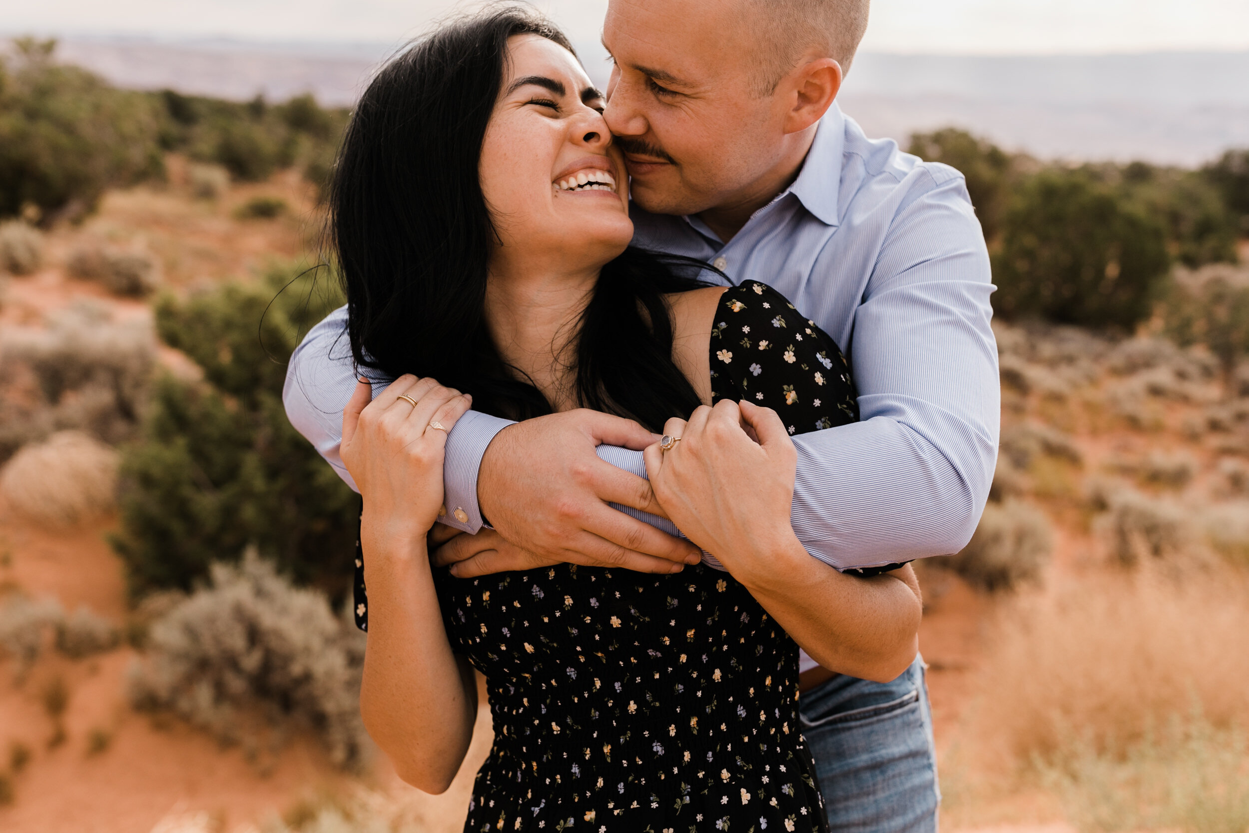 kimi + brett’s sunrise engagement photos in Moab, Utah with their dogs | utah elopement photographers | the hearnes adventure photography