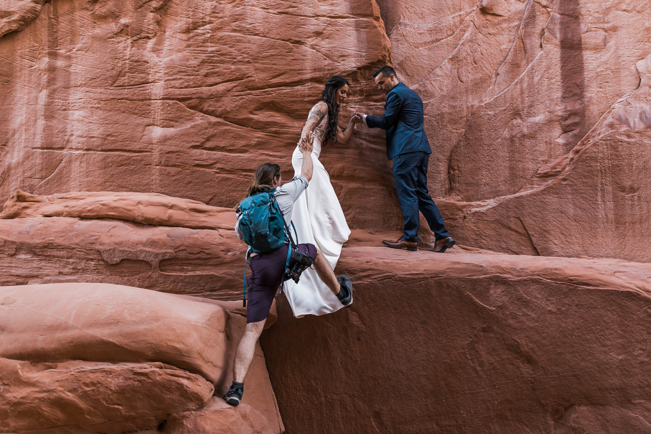 Sunrise elopement first look in Arches national park  | moab adventure wedding | the hearnes photography