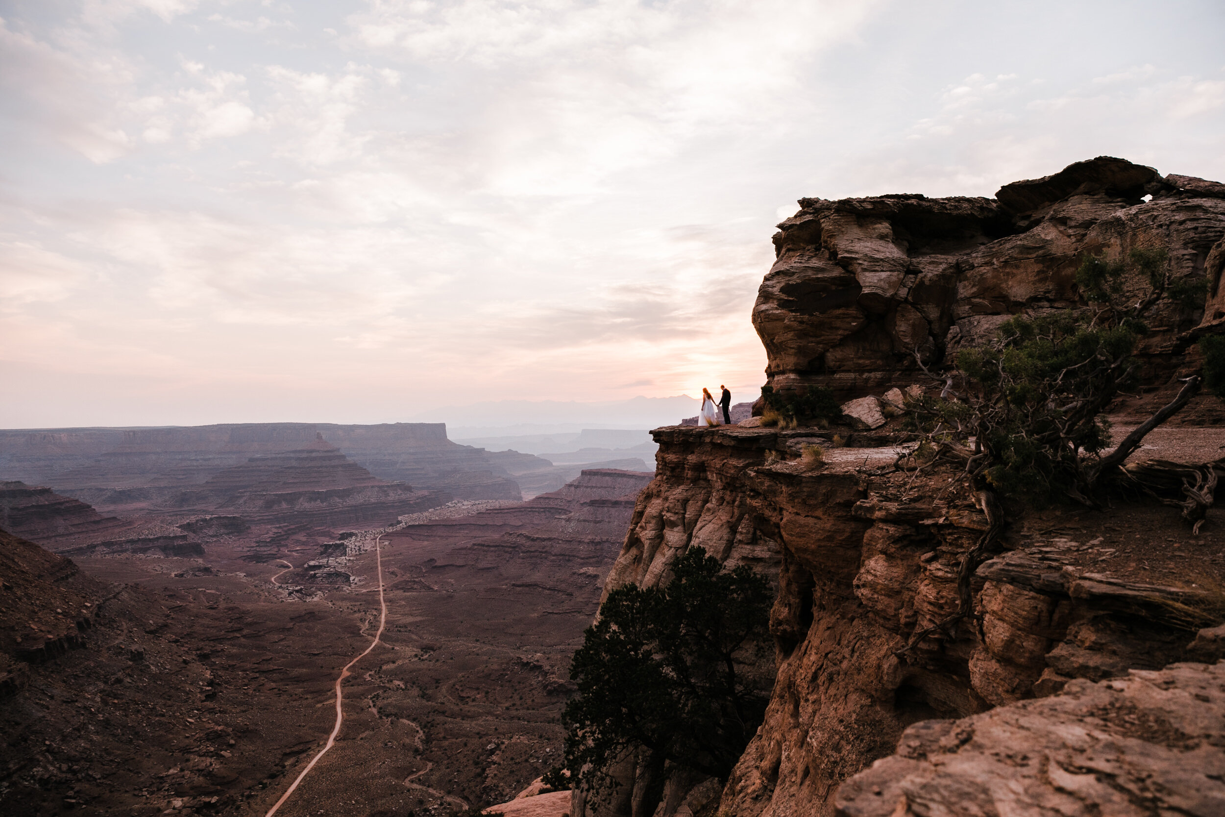 Sunrise wedding in the Moab desert with The Hearnes