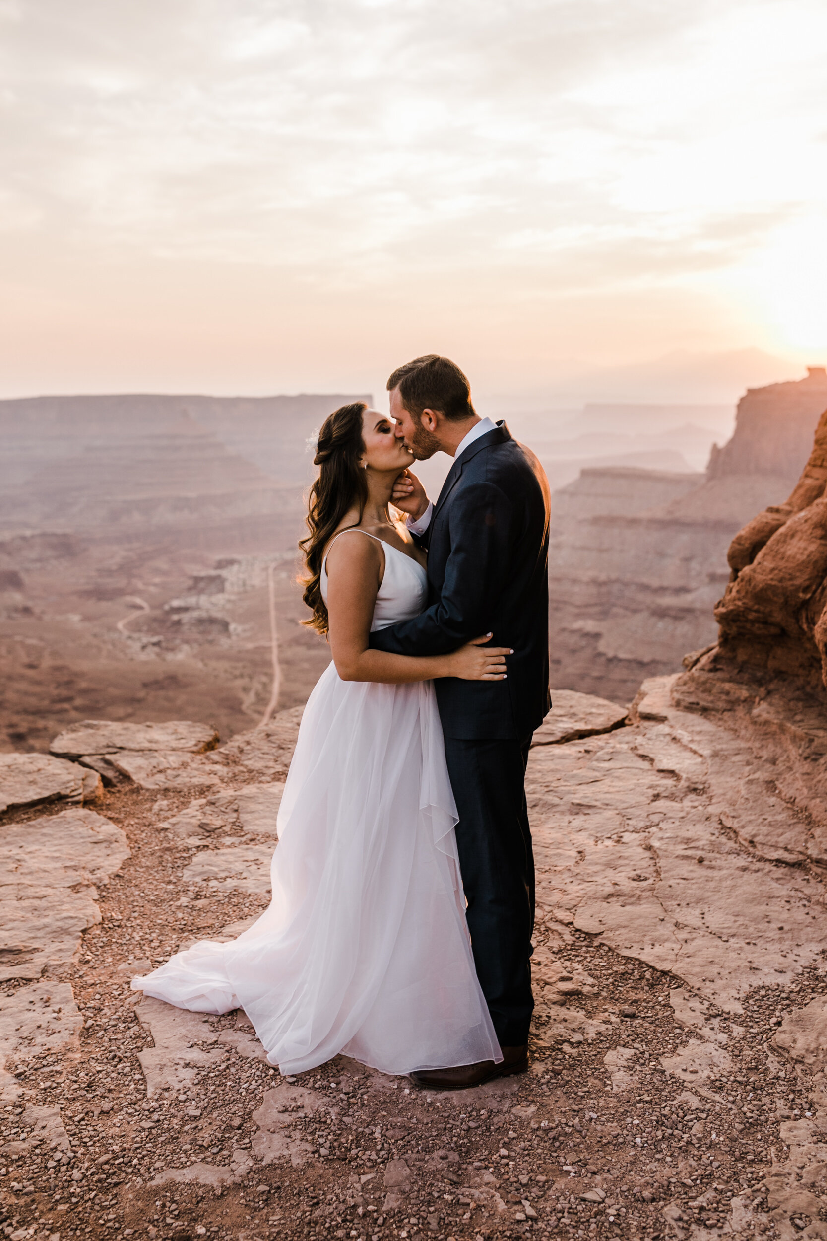 Sunrise wedding in the Moab desert with The Hearnes