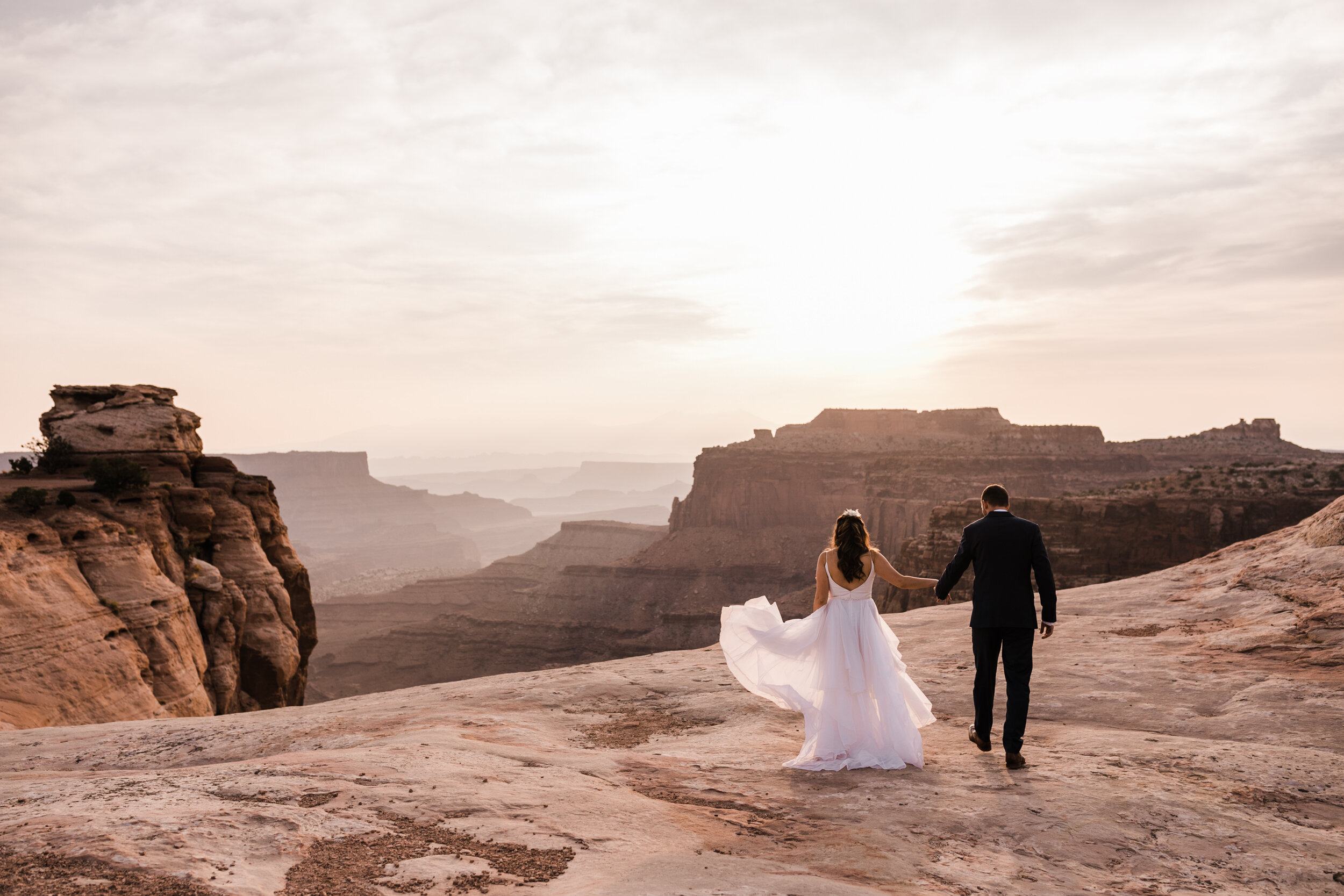 Sunrise wedding in the Moab desert with The Hearnes