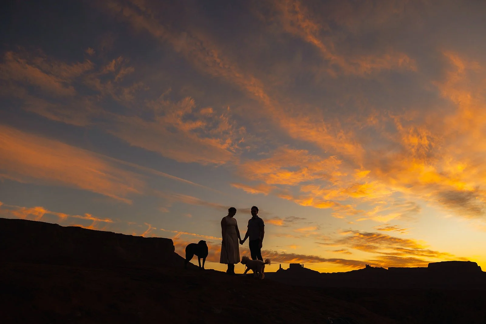 Authentic candid family photos in Moab, Utah desert with Abbi Hearne