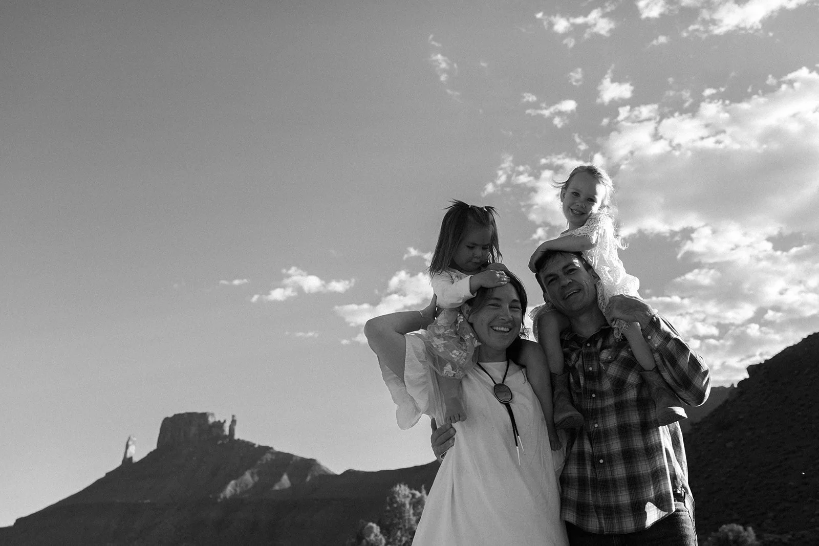 Authentic candid family photos in Moab, Utah desert with Abbi Hearne