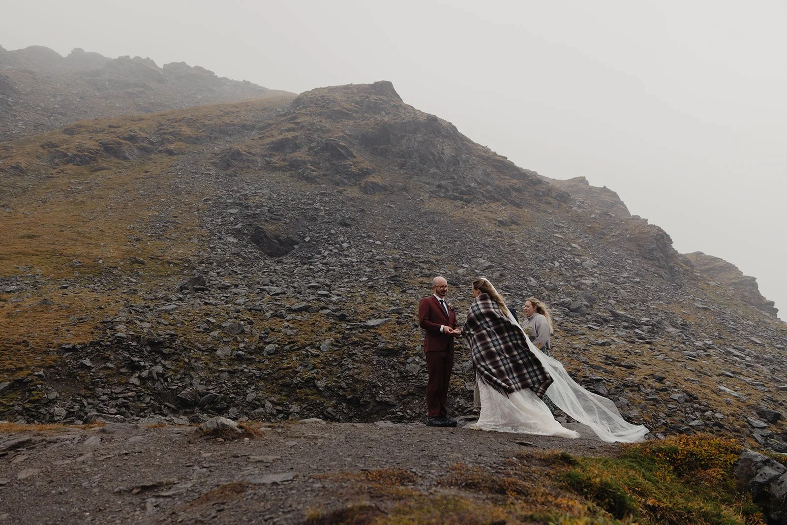Alaska micro wedding elopement with a helicopter flying to glaciers and mountain tops with The Hearnes Photography