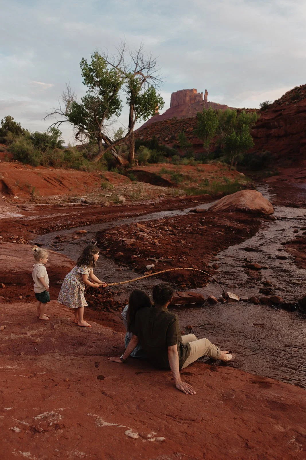 Authentic candid family photos in Moab, Utah desert with Abbi Hearne