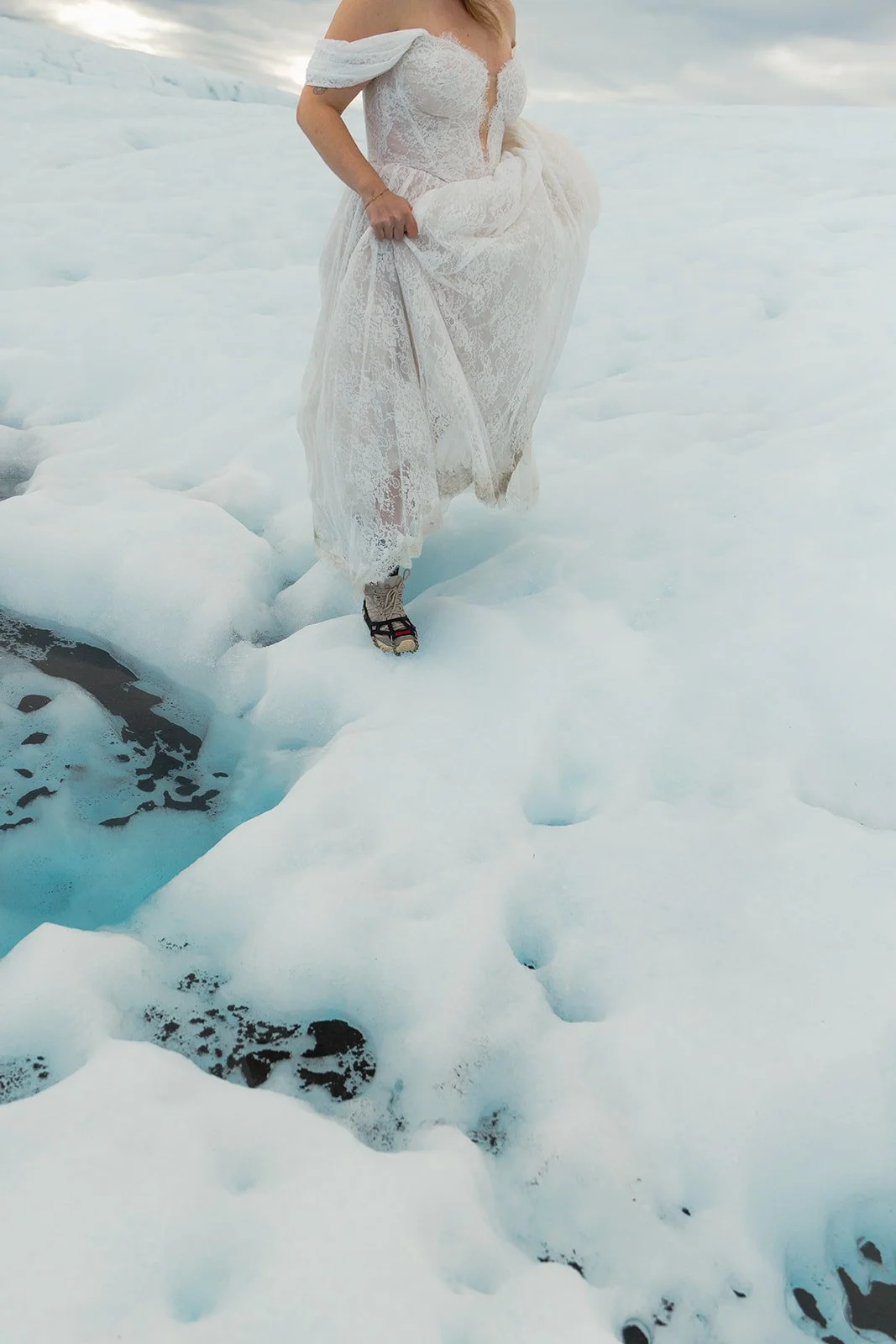 Alaska micro wedding elopement with a helicopter flying to glaciers and mountain tops with The Hearnes Photography