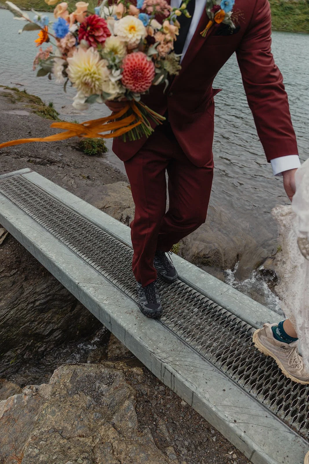 Alaska micro wedding elopement with a helicopter flying to glaciers and mountain tops with The Hearnes Photography
