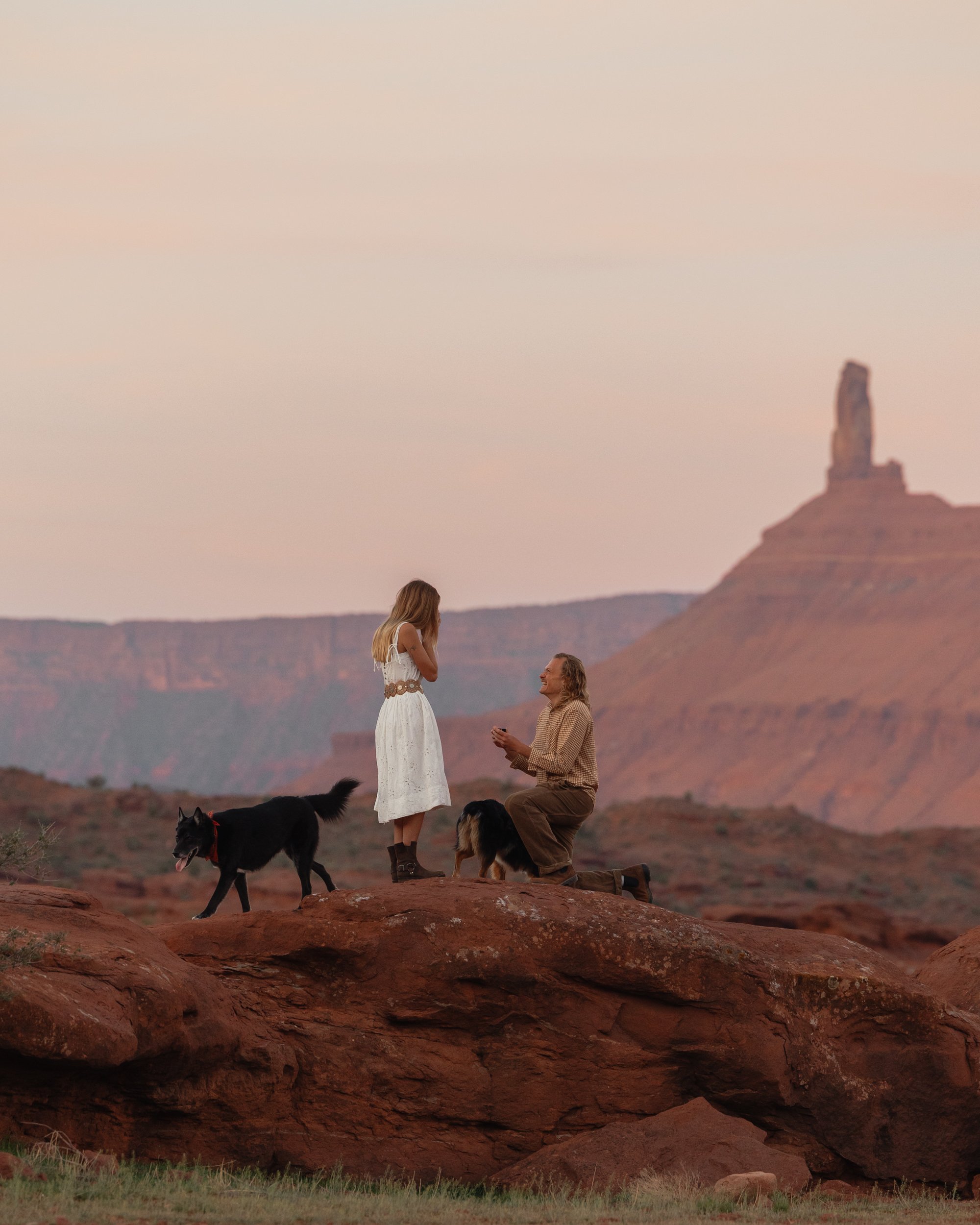 Rachel Harris @sunnrayy + Tanner Price @tanner.price_ engaged in Moab, Utah | sunrise surprise proposal with The Hearnes