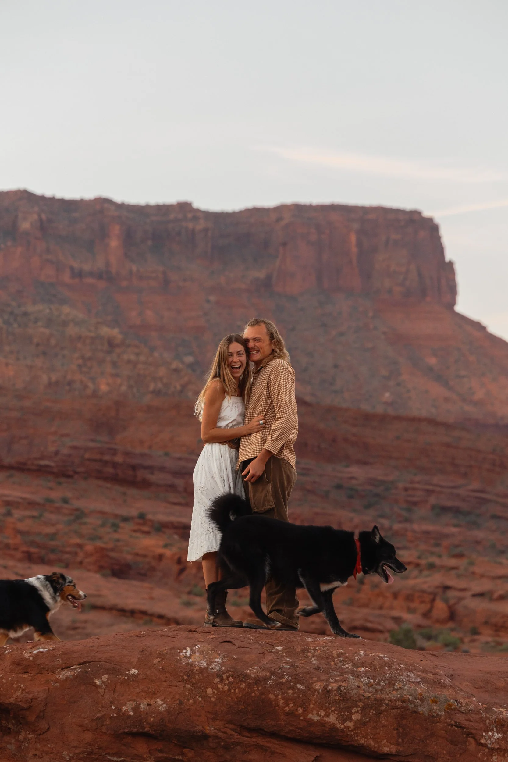 Rachel Harris @sunnrayy + Tanner Price @tanner.price_ engaged in Moab, Utah | sunrise surprise proposal with The Hearnes