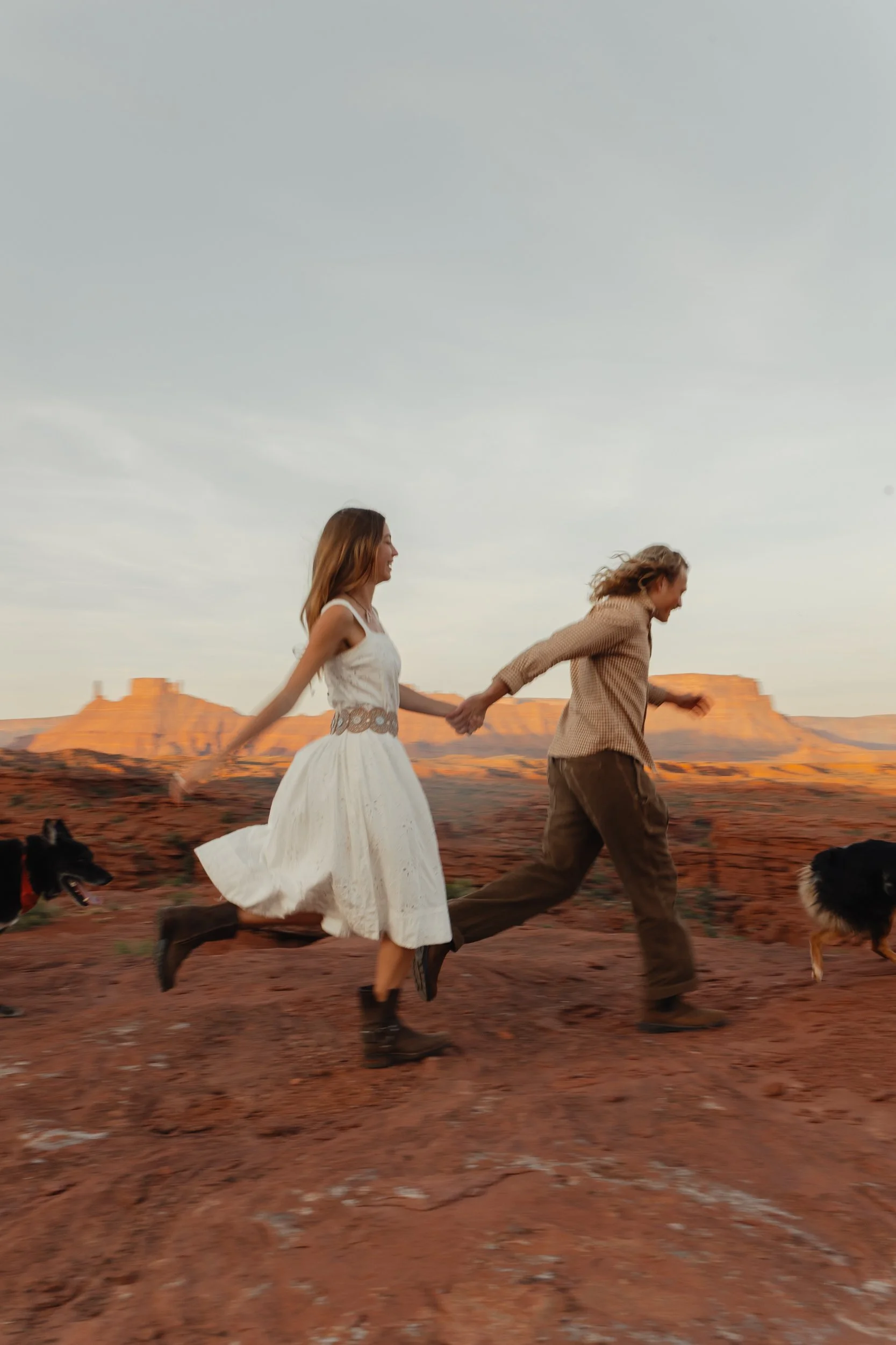 Rachel Harris @sunnrayy + Tanner Price @tanner.price_ engaged in Moab, Utah | sunrise surprise proposal with The Hearnes
