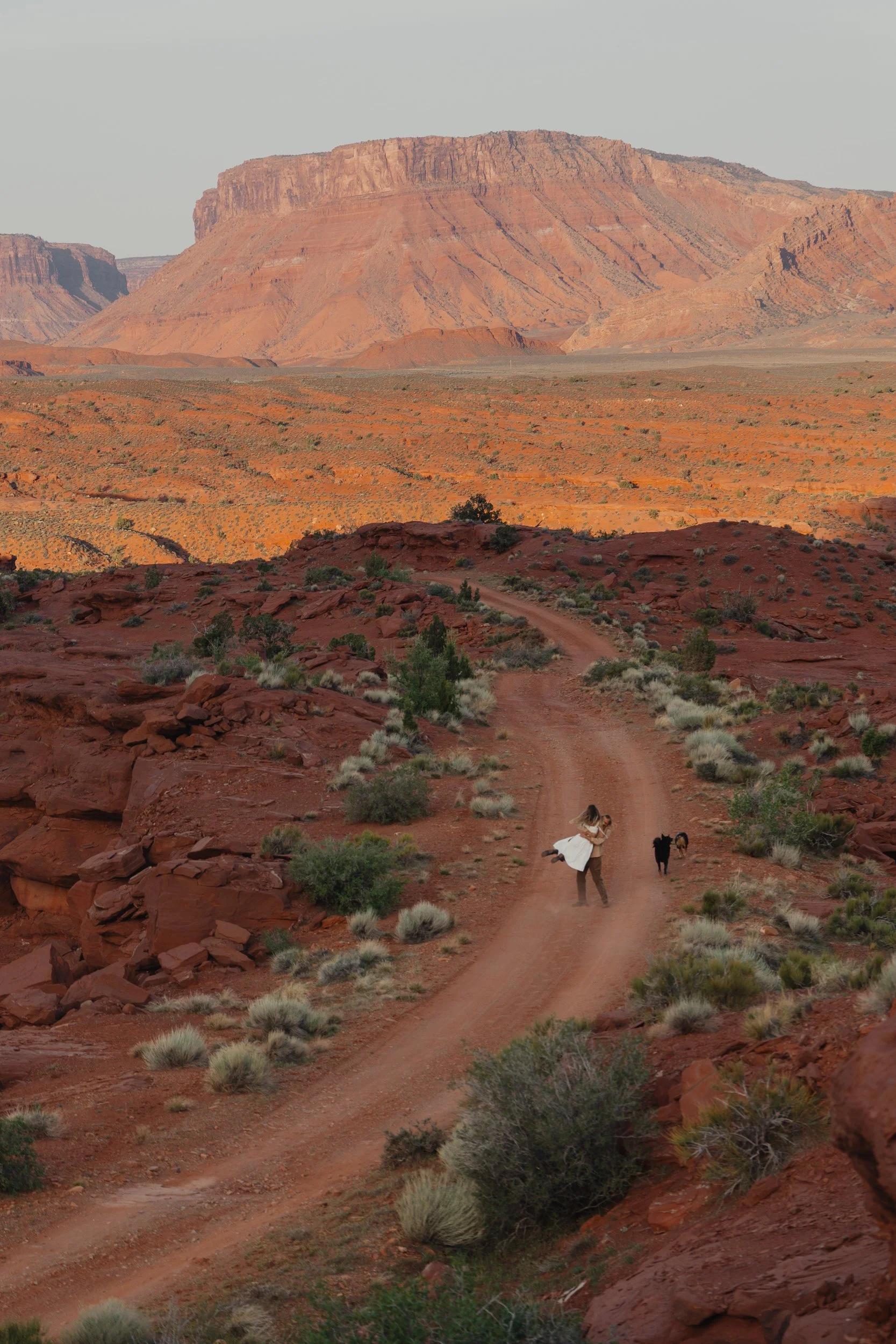 Rachel Harris @sunnrayy + Tanner Price @tanner.price_ engaged in Moab, Utah | sunrise surprise proposal with The Hearnes