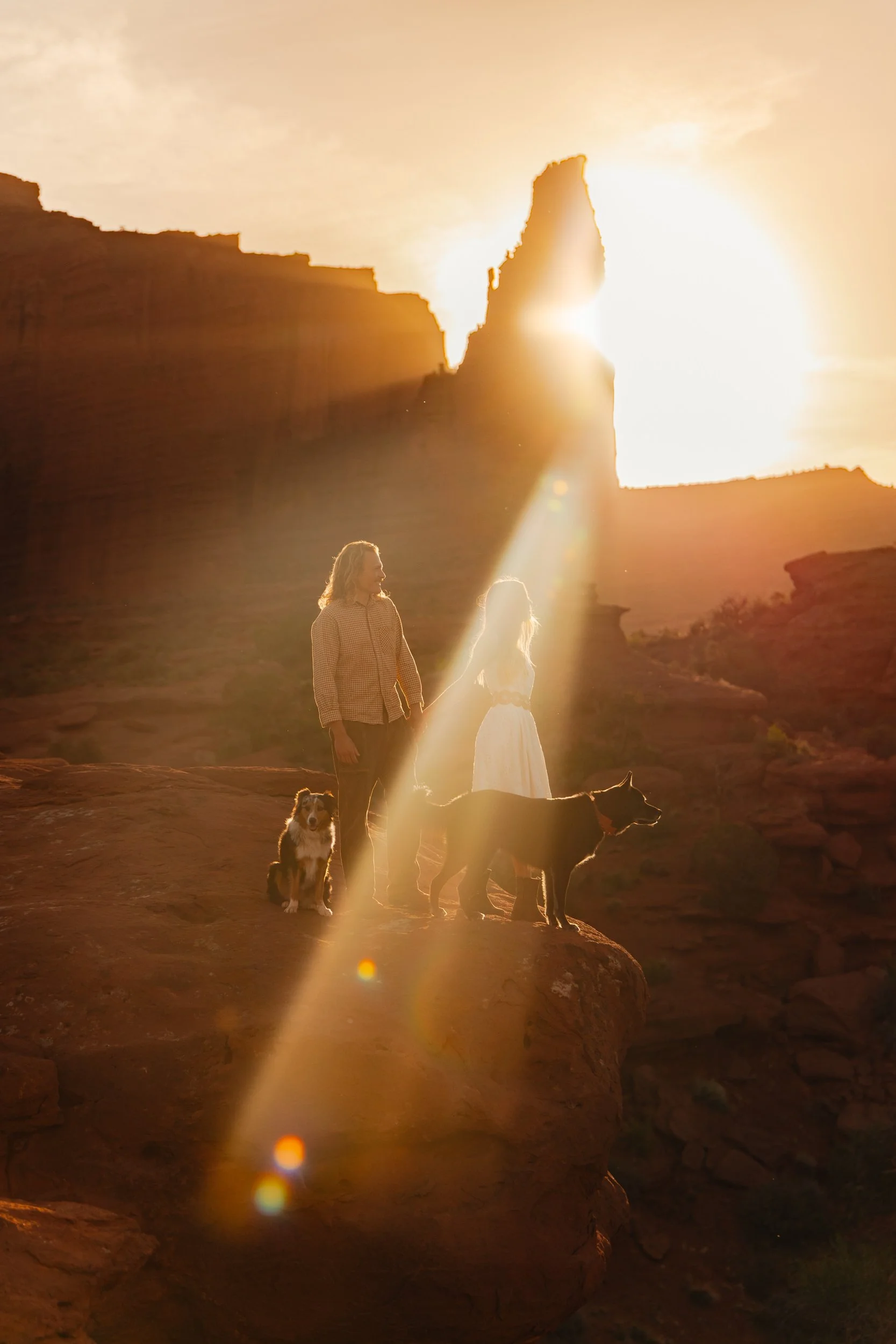 Rachel Harris @sunnrayy + Tanner Price @tanner.price_ engaged in Moab, Utah | sunrise surprise proposal with The Hearnes