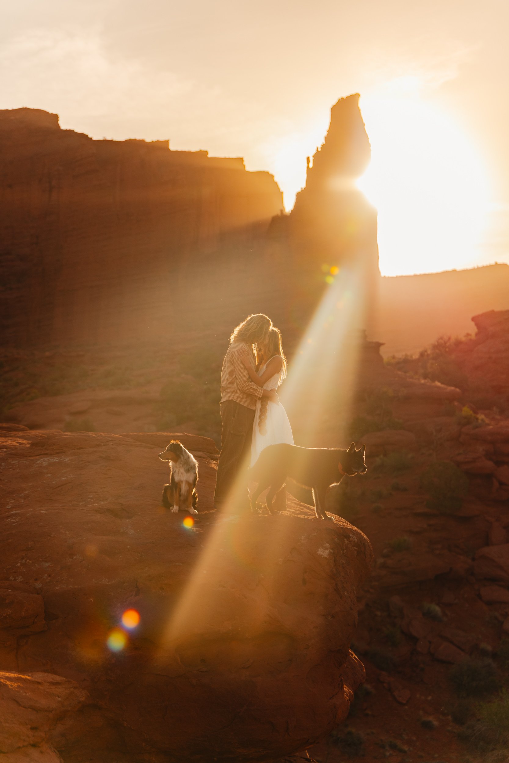 Rachel Harris @sunnrayy + Tanner Price @tanner.price_ engaged in Moab, Utah | sunrise surprise proposal with The Hearnes