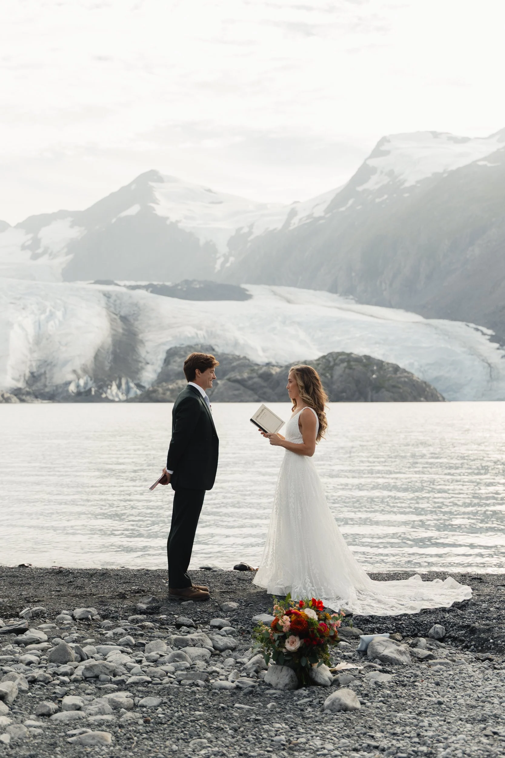 Hiking mountain top elopement in Alaska surrounded by glaciers | the hearnes adventure photography