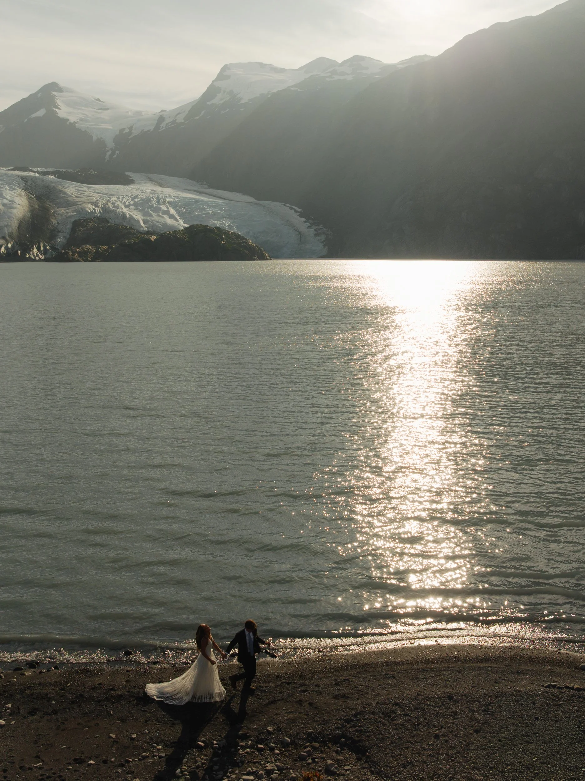 Hiking mountain top elopement in Alaska surrounded by glaciers | the hearnes adventure photography
