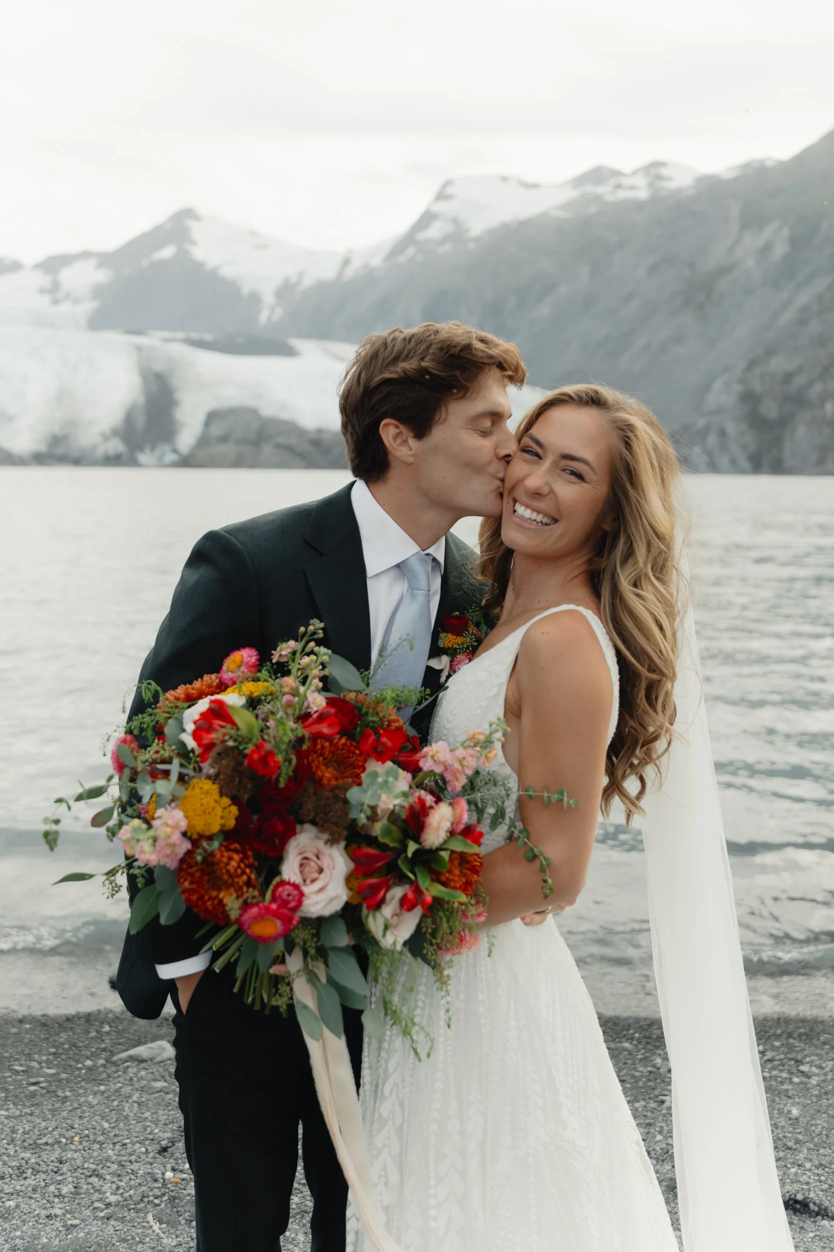 Hiking mountain top elopement in Alaska surrounded by glaciers | the hearnes adventure photography