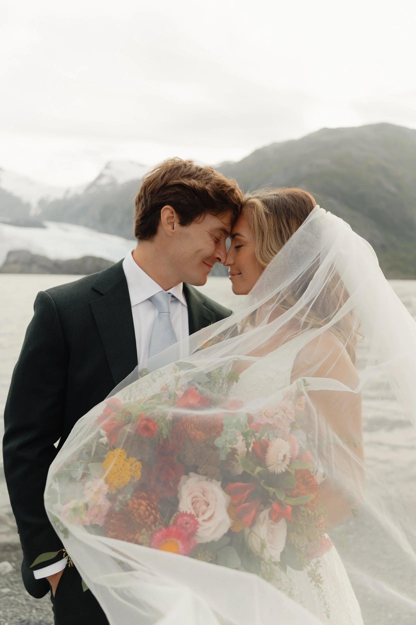 Hiking mountain top elopement in Alaska surrounded by glaciers | the hearnes adventure photography