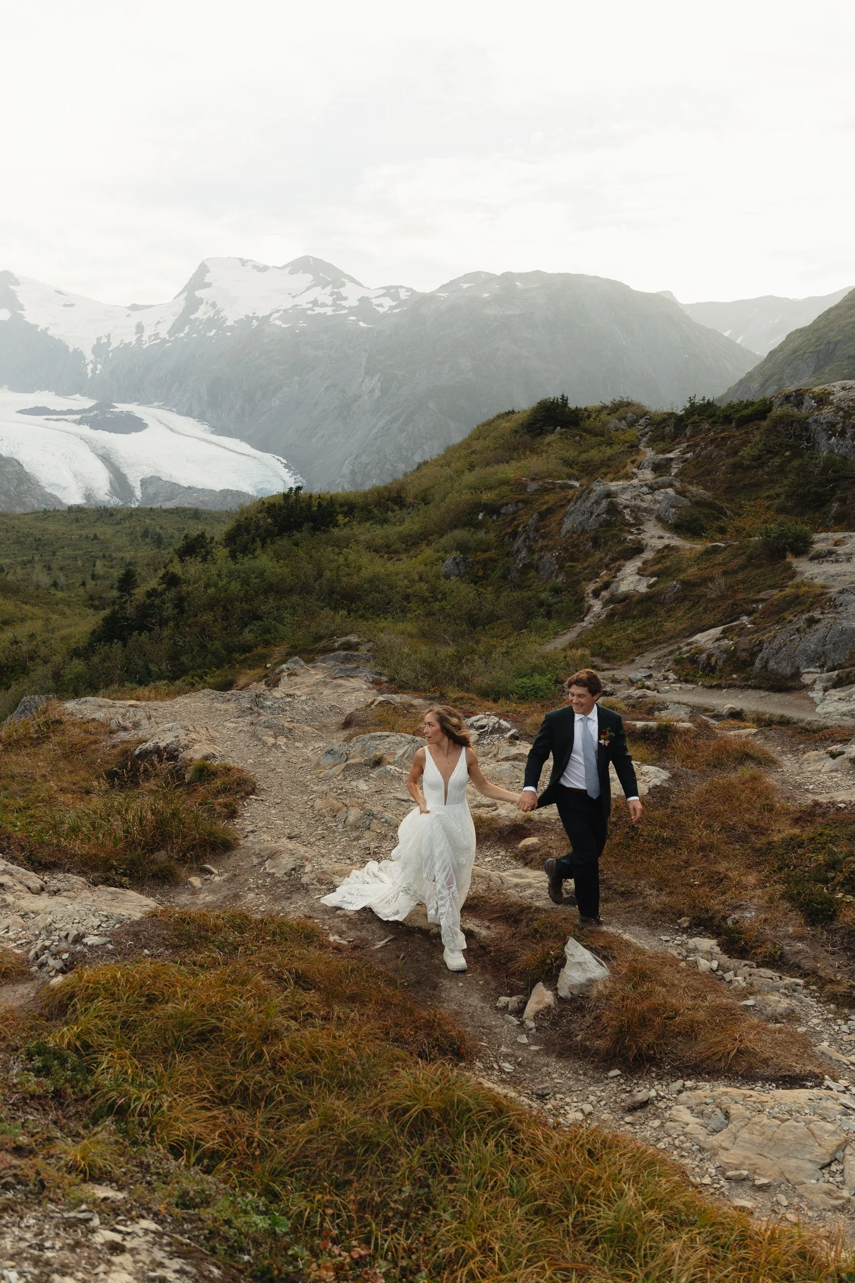 Hiking mountain top elopement in Alaska surrounded by glaciers | the hearnes adventure photography