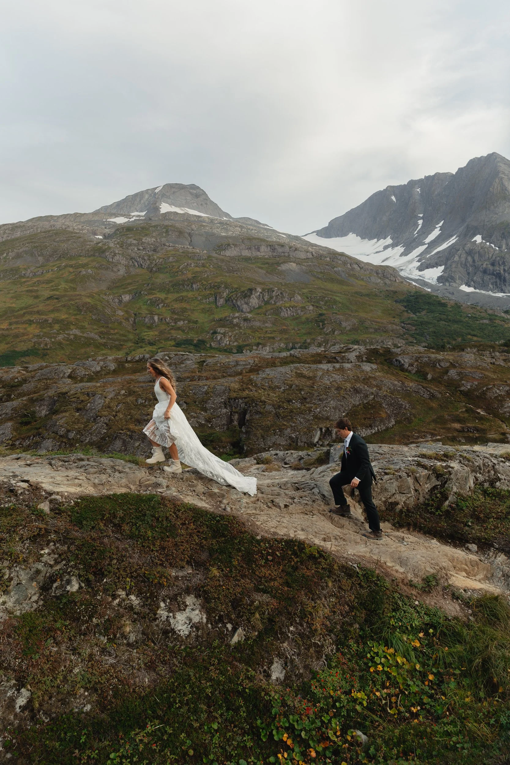 Hiking mountain top elopement in Alaska surrounded by glaciers | the hearnes adventure photography