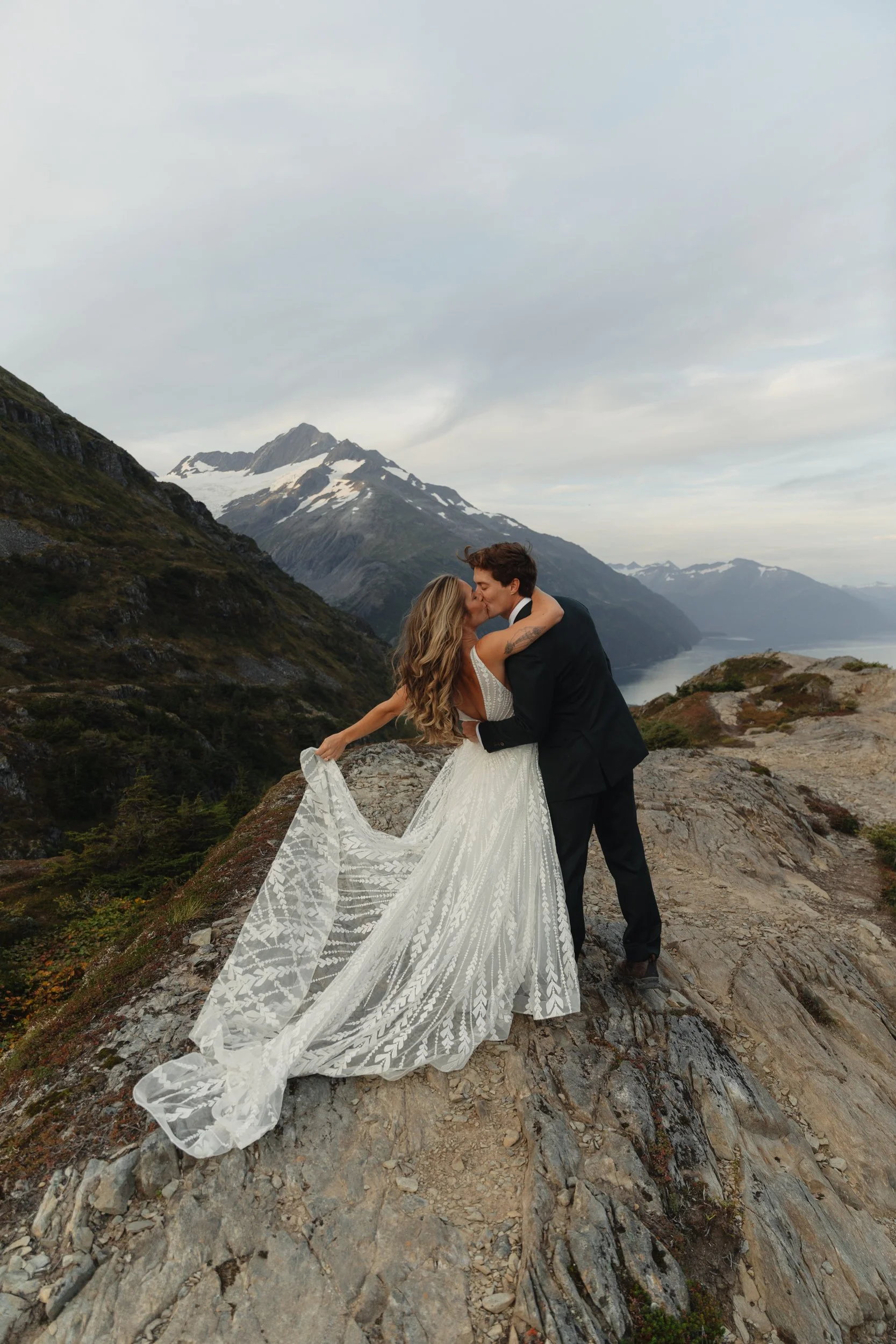 Hiking mountain top elopement in Alaska surrounded by glaciers | the hearnes adventure photography